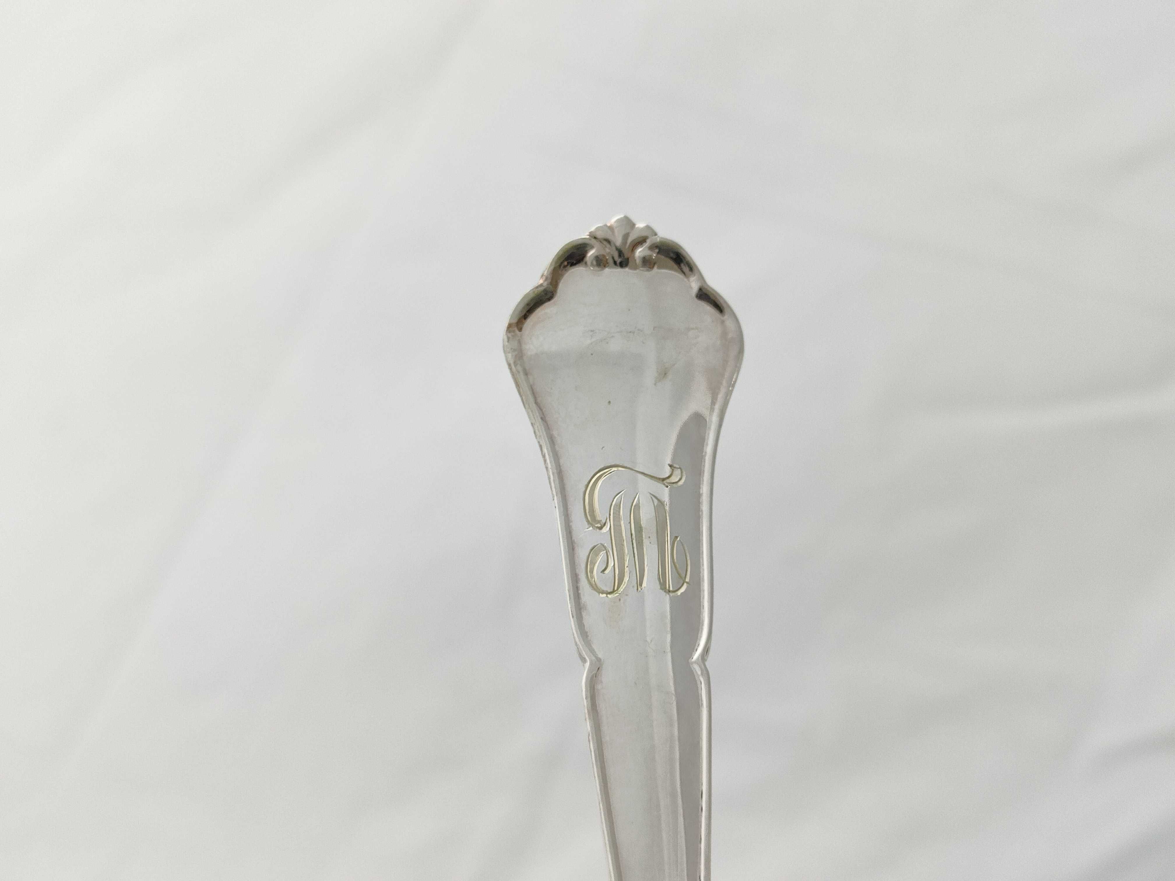 A Set of Nine 830 Silver Three-Tine Forks with Shell Terminals, Late 19th-early 20th C.
