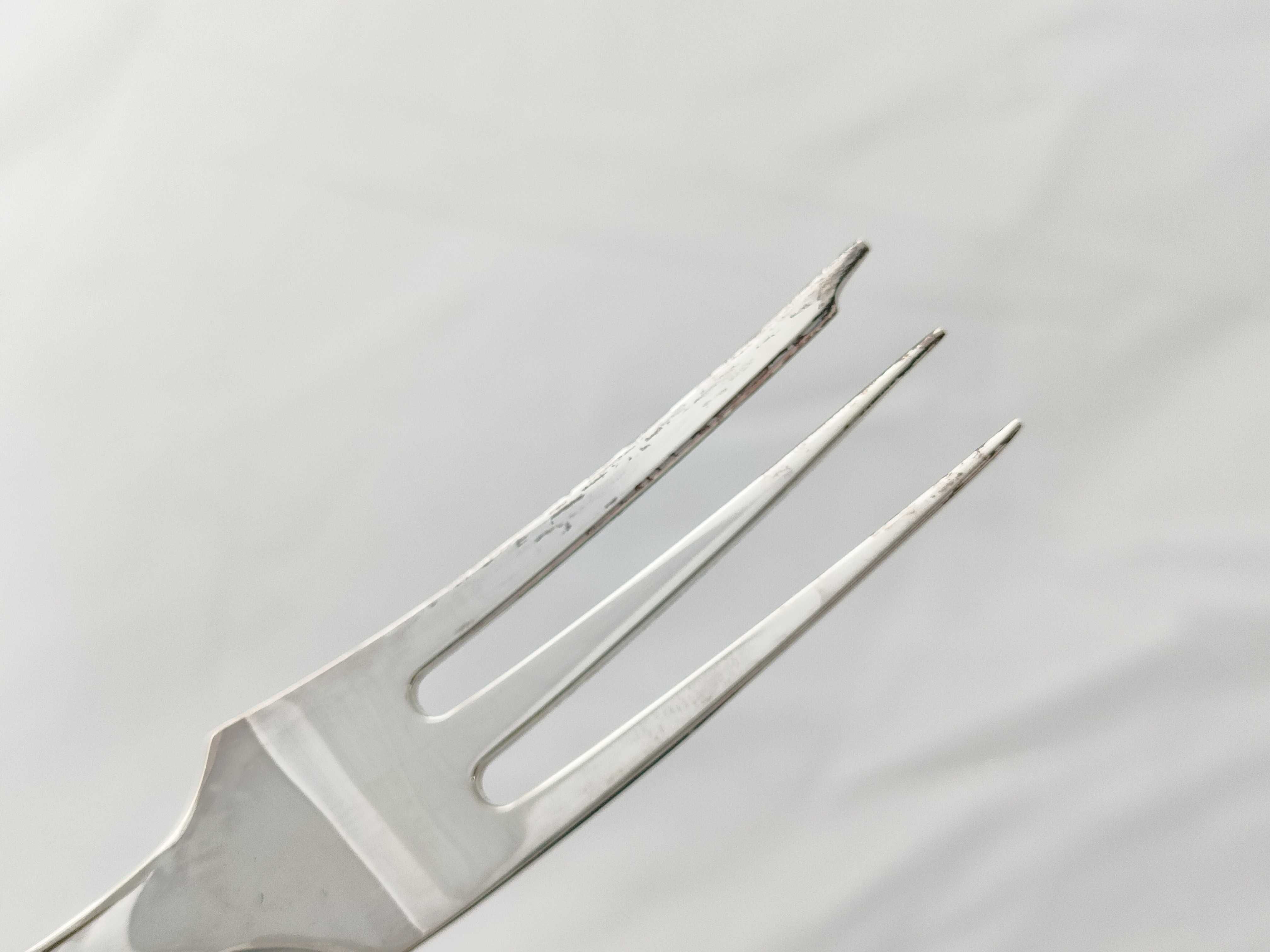 A Set of Nine 830 Silver Three-Tine Forks with Shell Terminals, Late 19th-early 20th C.