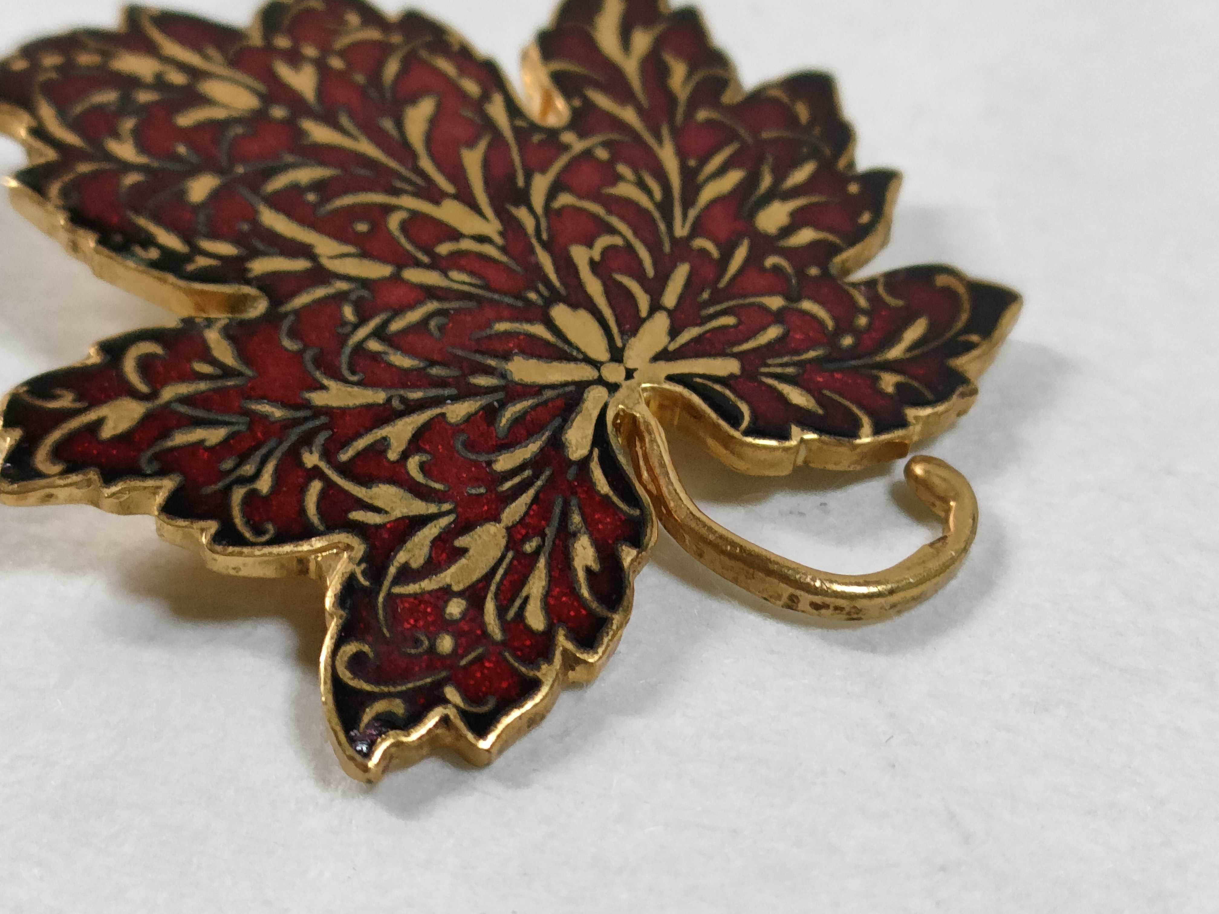 Two Metropolitan Museum of Art MMA Gold-Tone and Enamel Maple Leaf Brooches