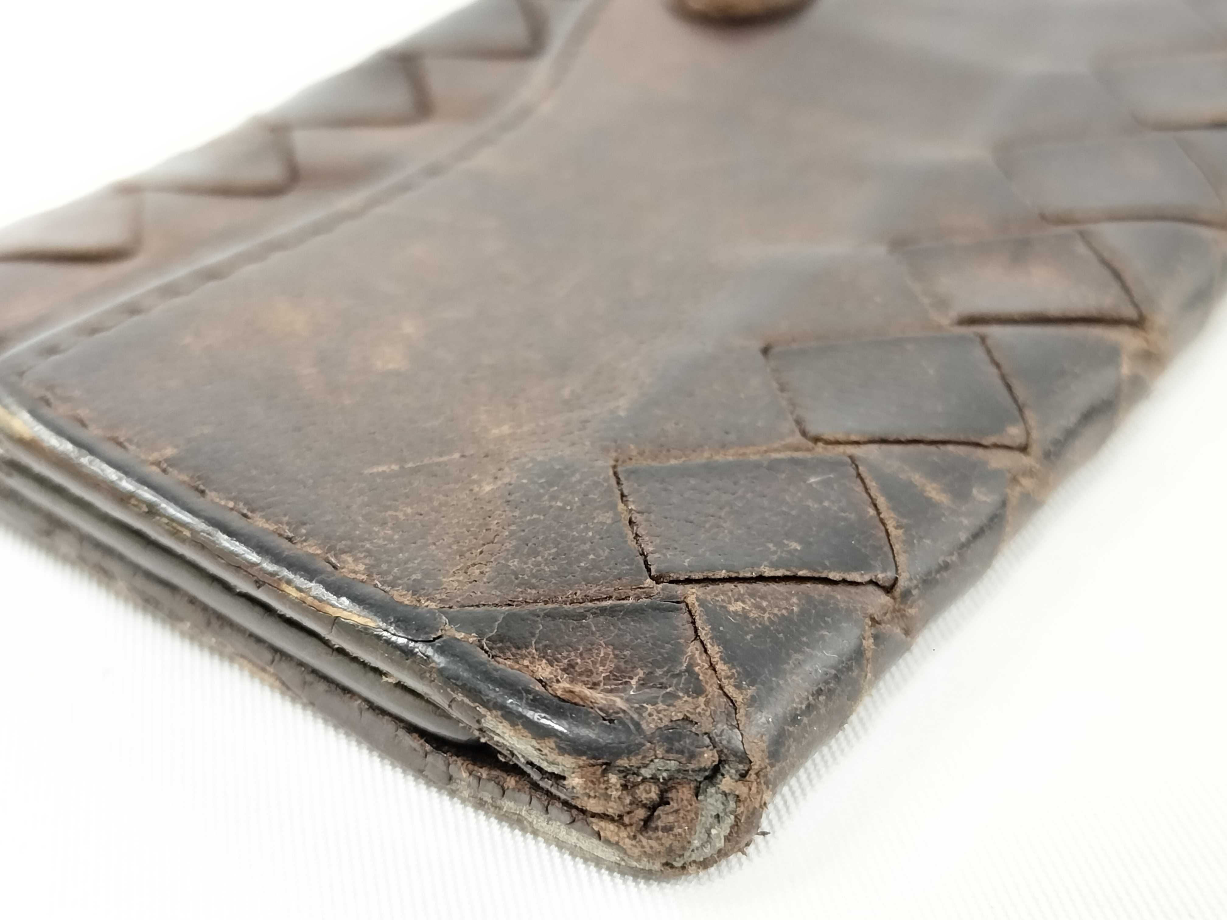 A Collection of Five Designer Leather Key Cases - Cartier, Bvlgari, Bottega Veneta, and Lanvin