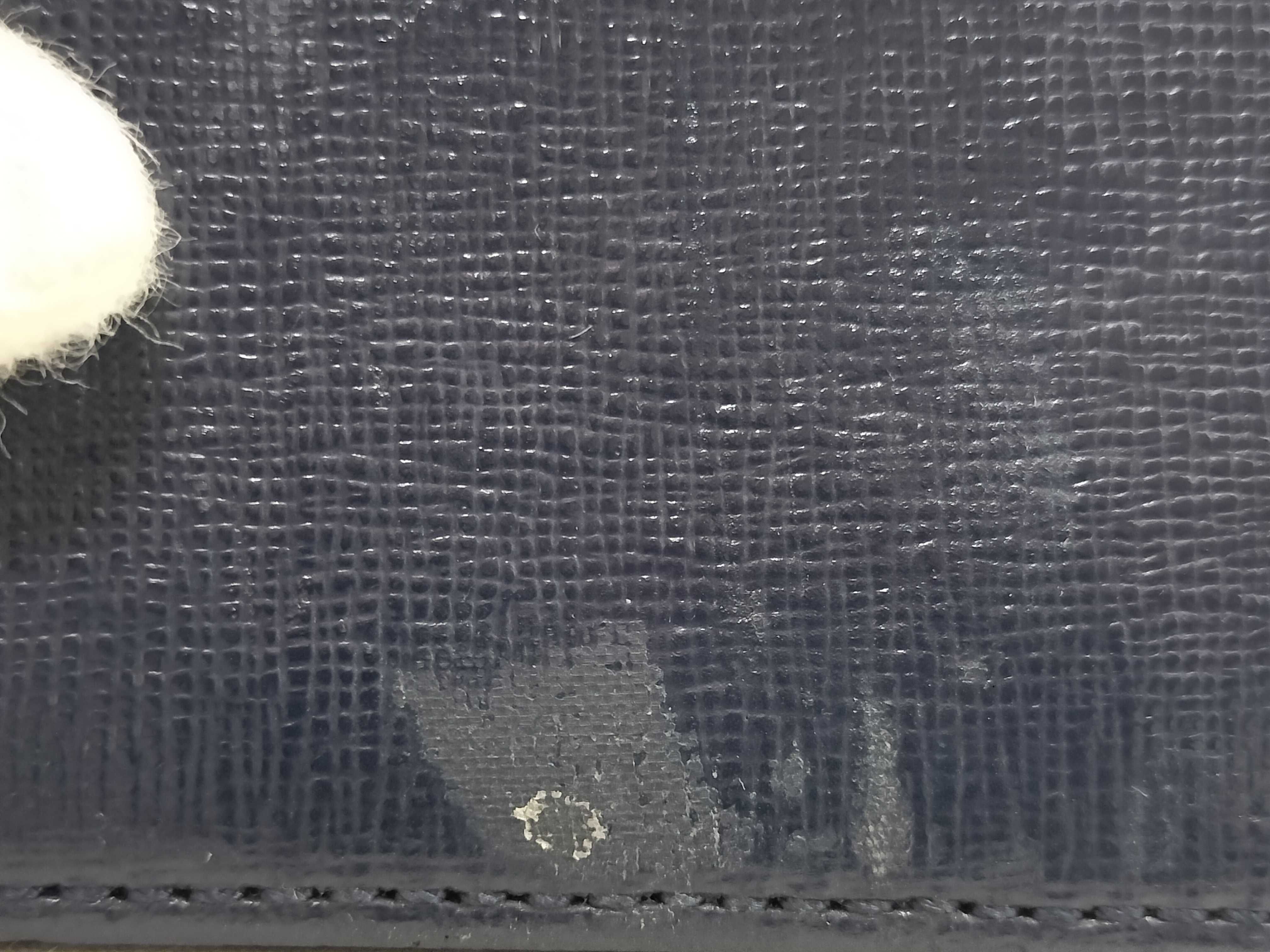 A Collection of Five Designer Leather Key Cases - Cartier, Bvlgari, Bottega Veneta, and Lanvin