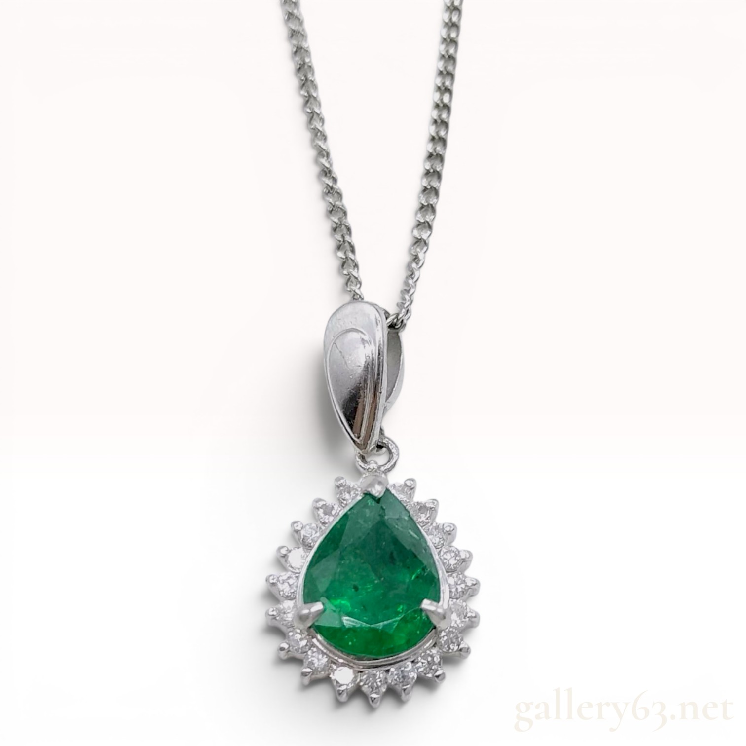 Platinum Emerald and Diamond Halo Pendant Necklace