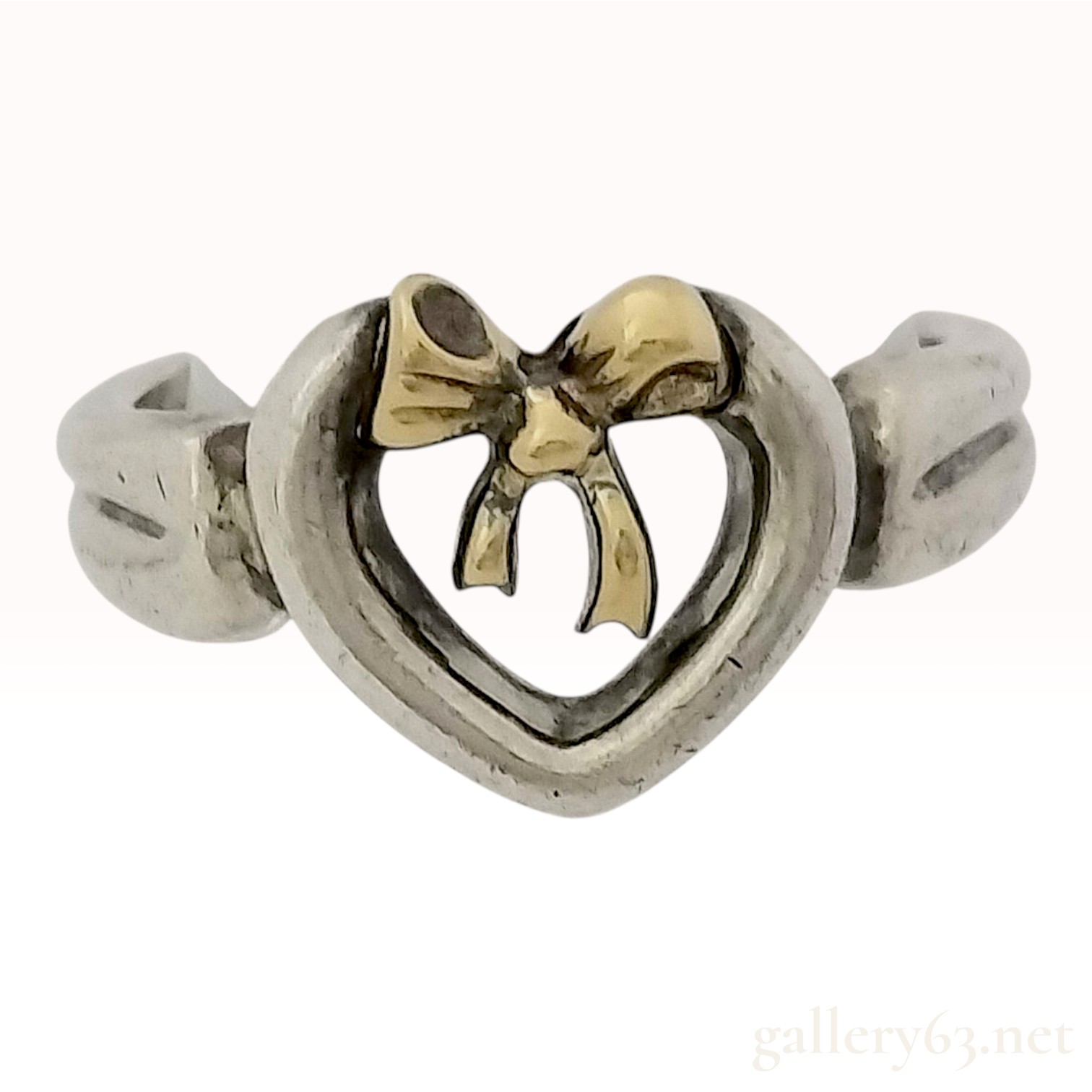 Tiffany & Co. 1991 Sterling Silver and 18K Yellow Gold Heart and Bow Ring