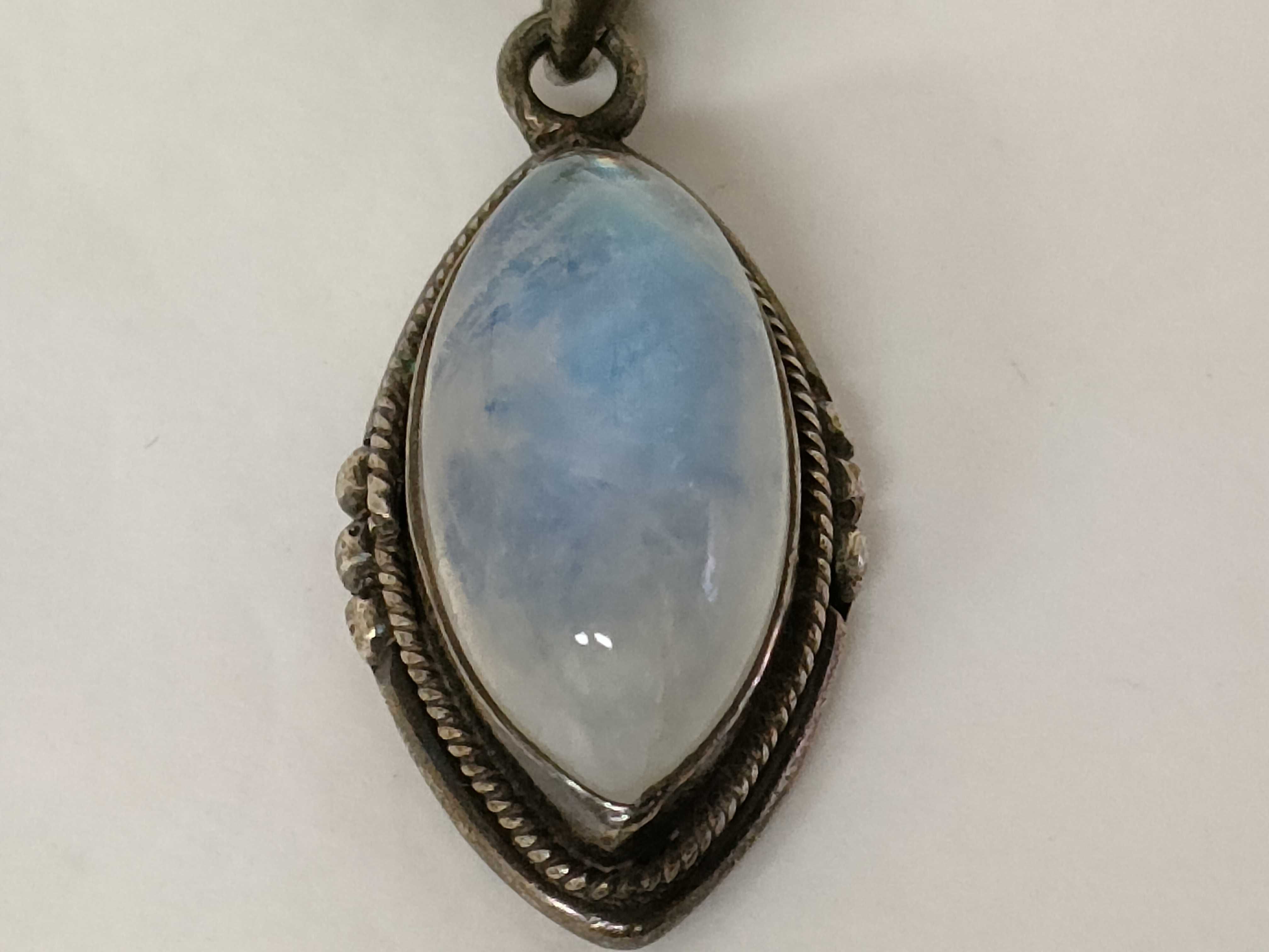 An Assortment of Vintage Sterling Silver Jewelry including Moonstone and Garnet