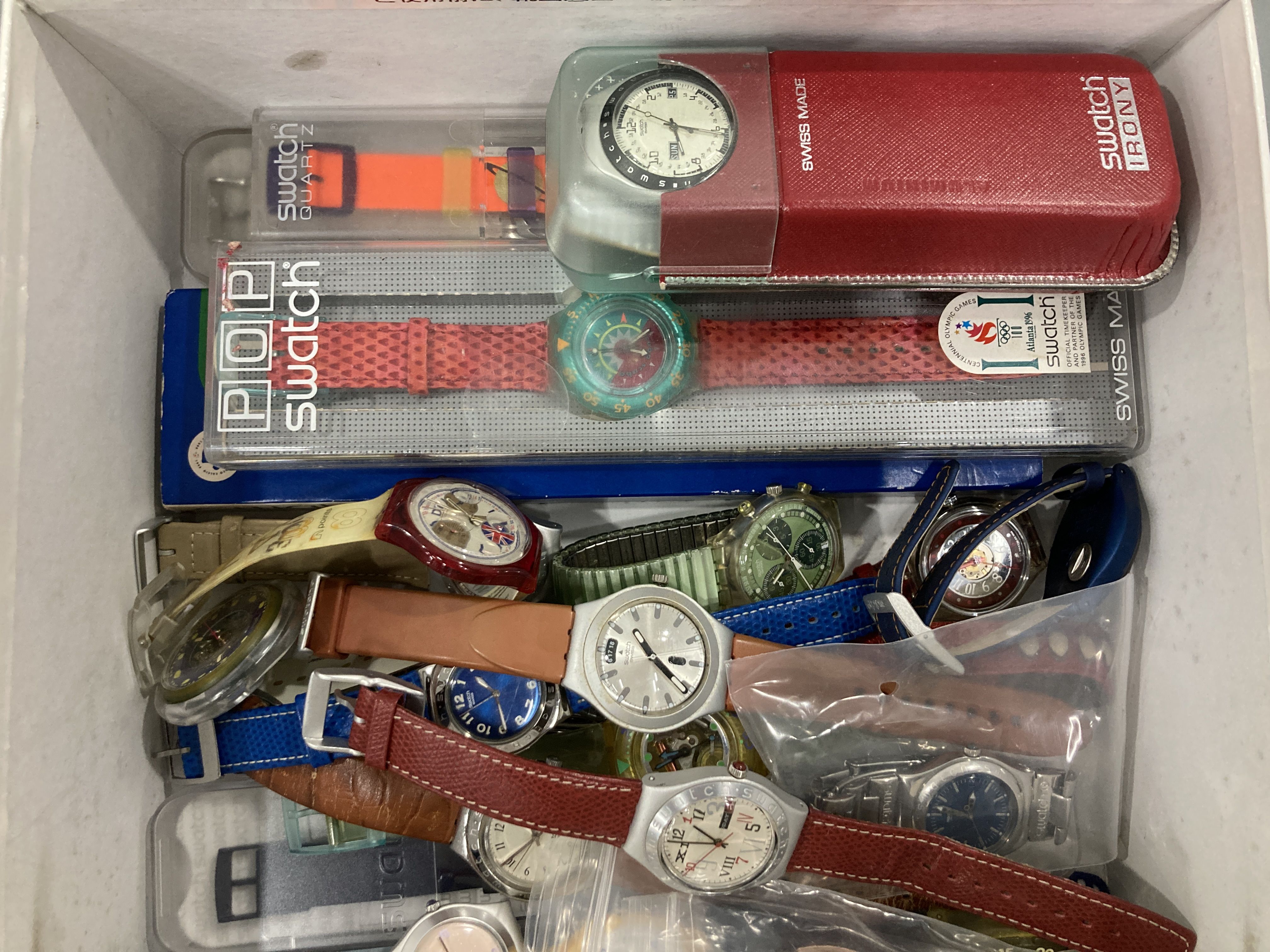 A Collection of Approximately 25 Swatch Wristwatches