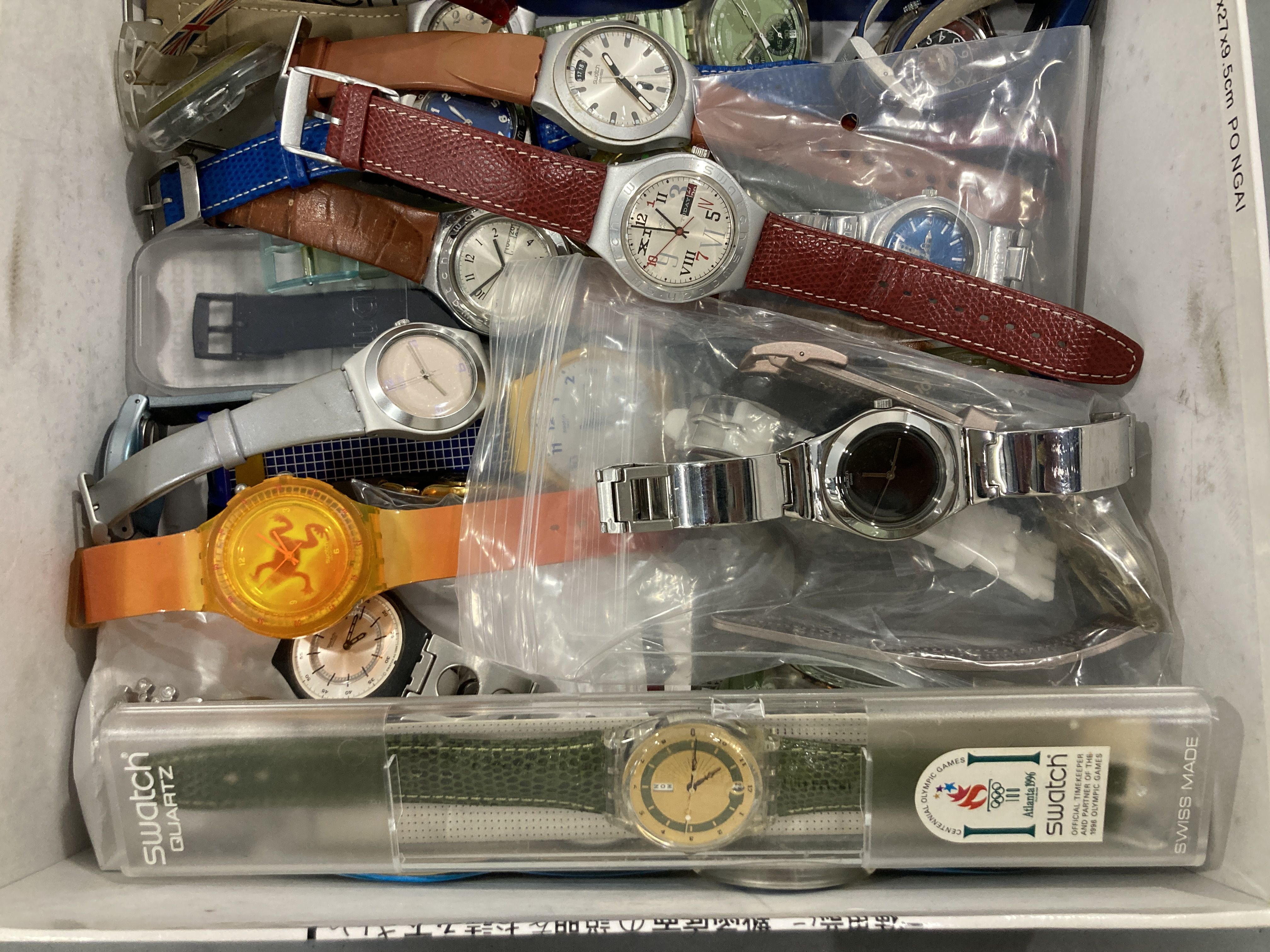 A Collection of Approximately 25 Swatch Wristwatches