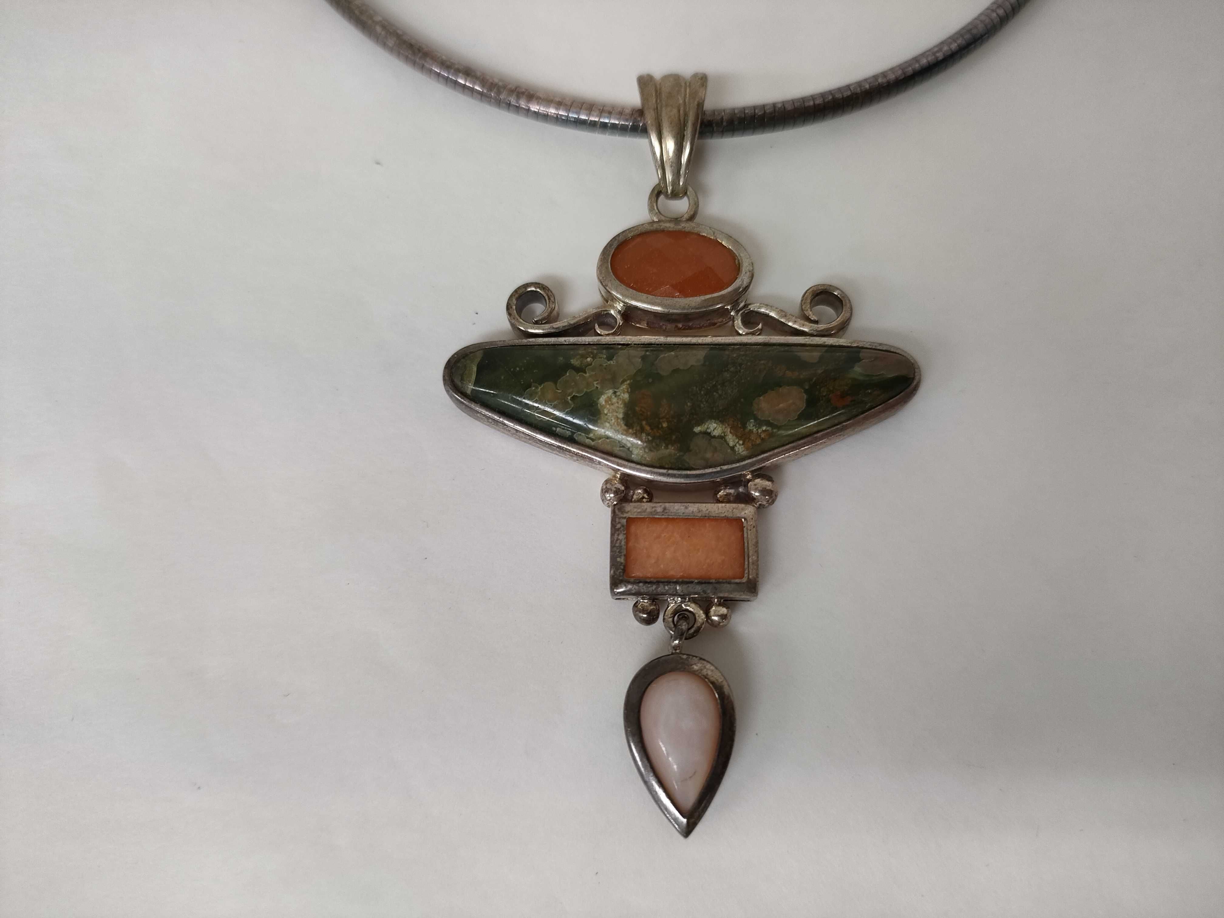 A Collection of Four Sterling Silver and Gemstone Jewelry Items