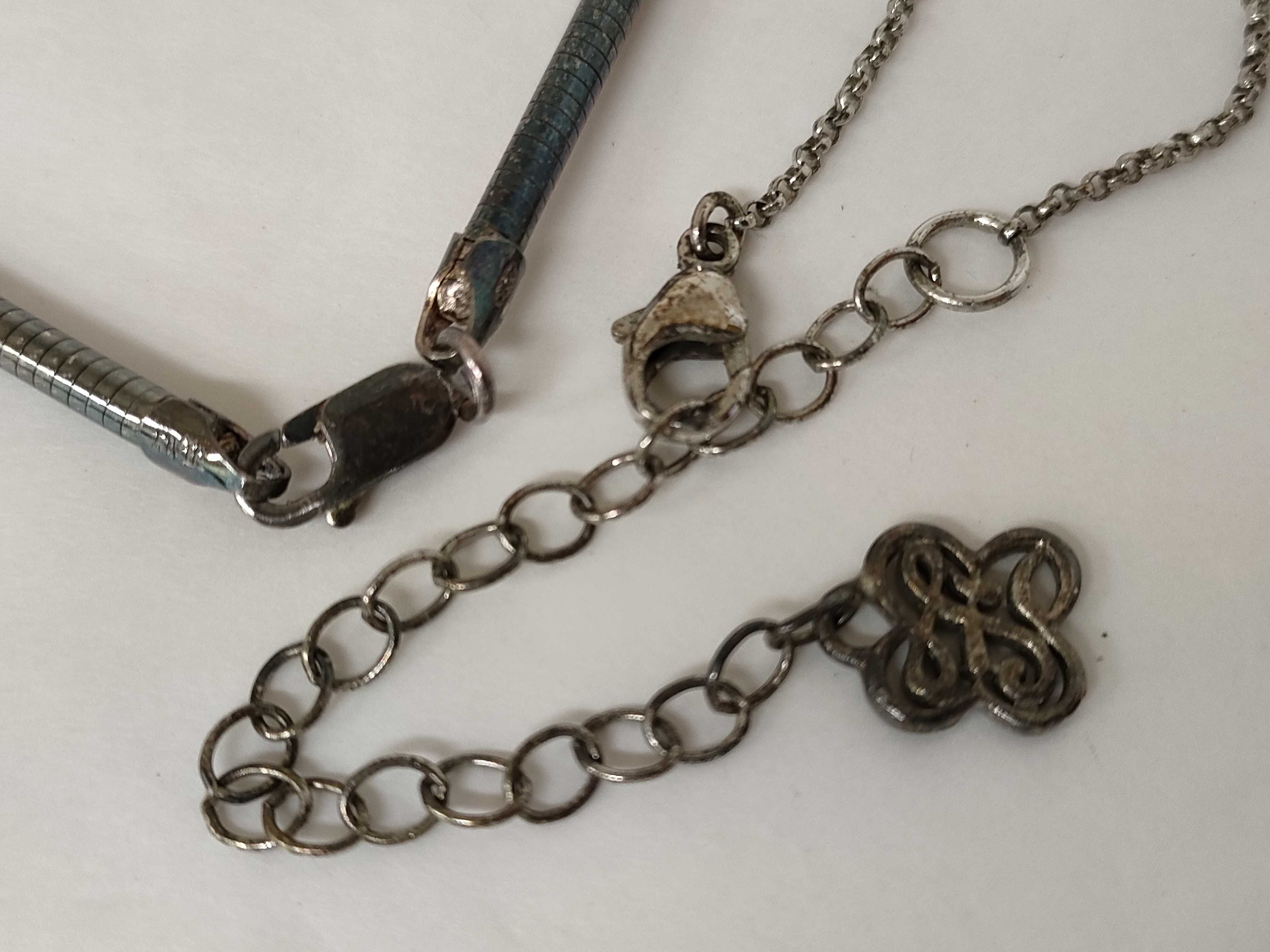 A Collection of Four Sterling Silver and Gemstone Jewelry Items