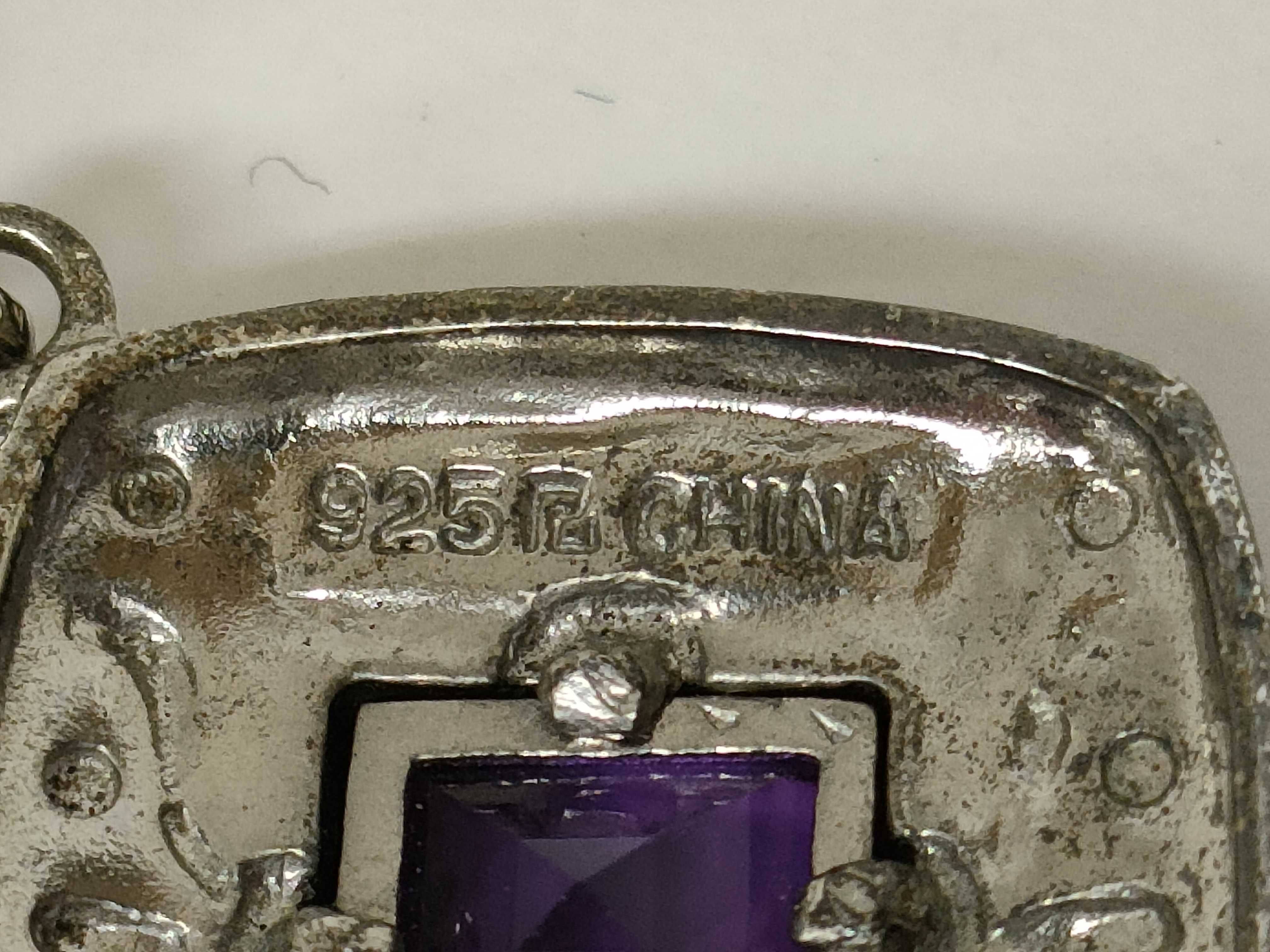 A Collection of Four Sterling Silver and Gemstone Jewelry Items