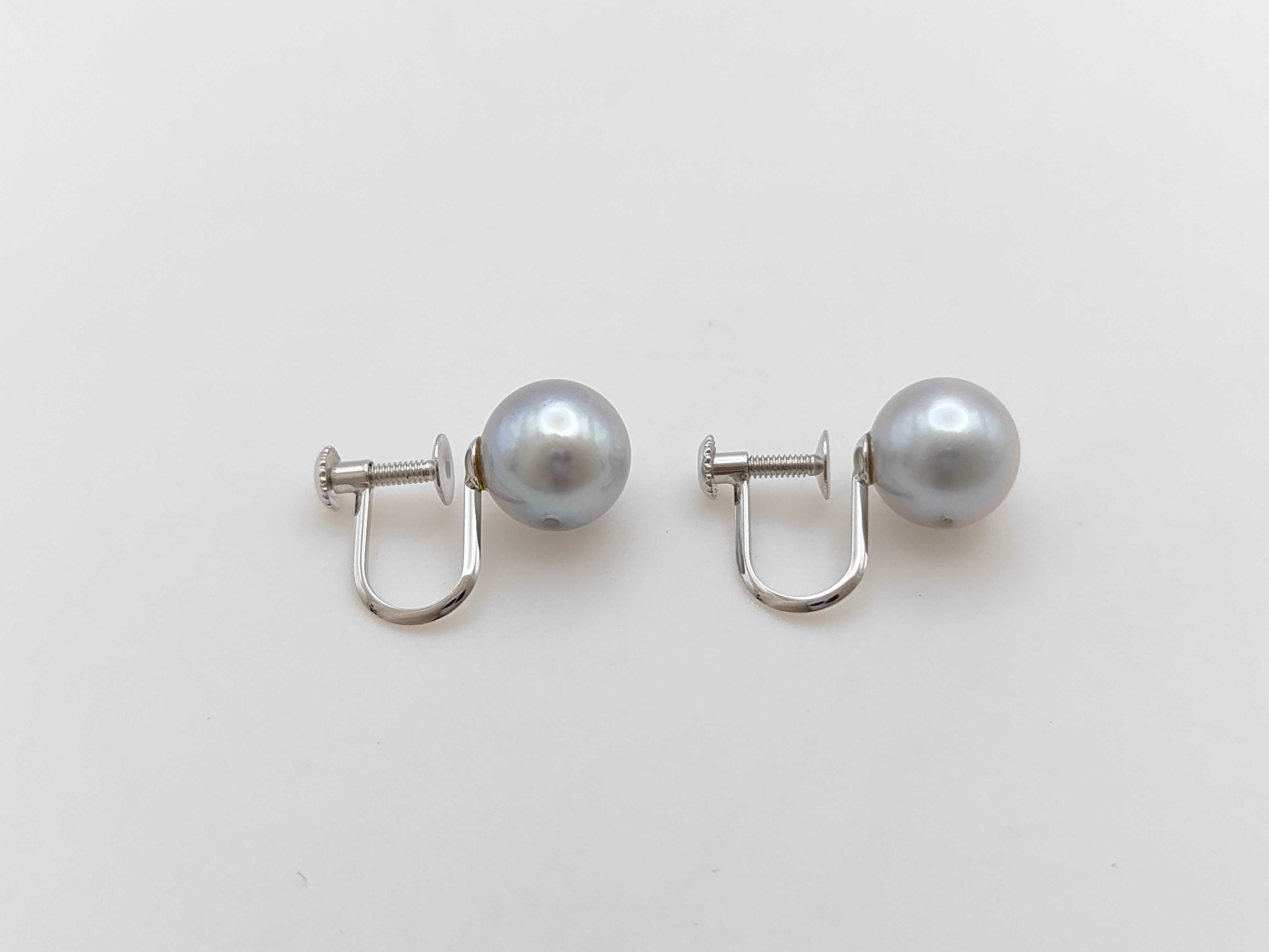 A Pair of Grey Cultured Pearl and 14 Karat White Gold Screw-Back Earrings