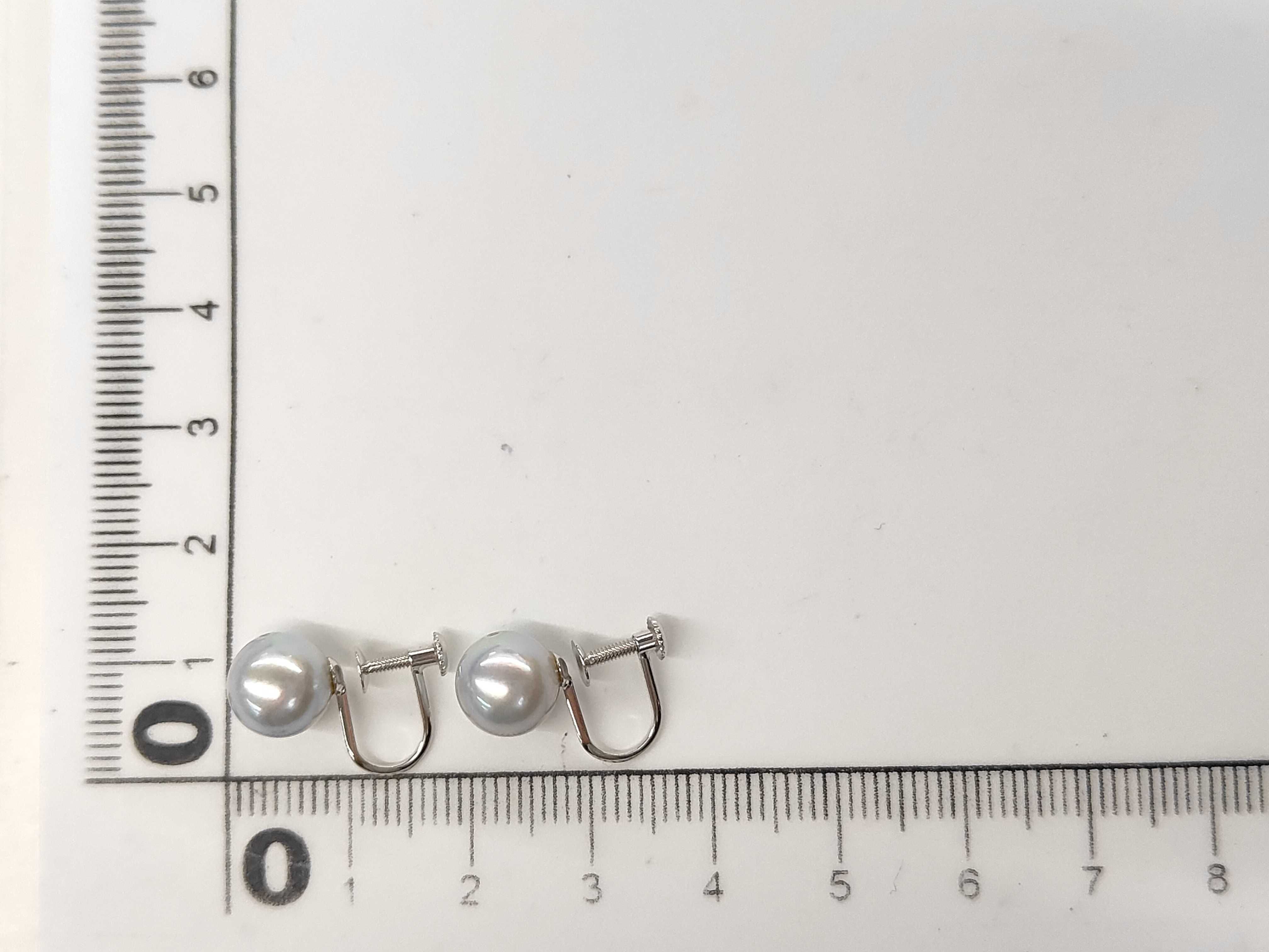 A Pair of Grey Cultured Pearl and 14 Karat White Gold Screw-Back Earrings