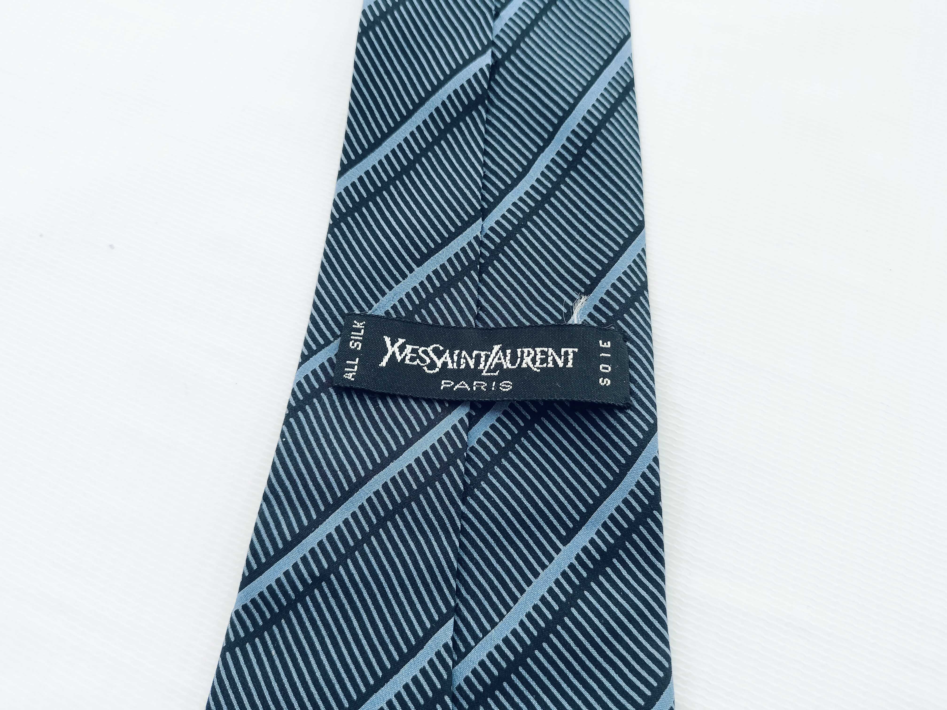 A Collection of Six Designer Silk Neckties Including Salvatore Ferragamo, Fendi, and Yves Saint Laurent