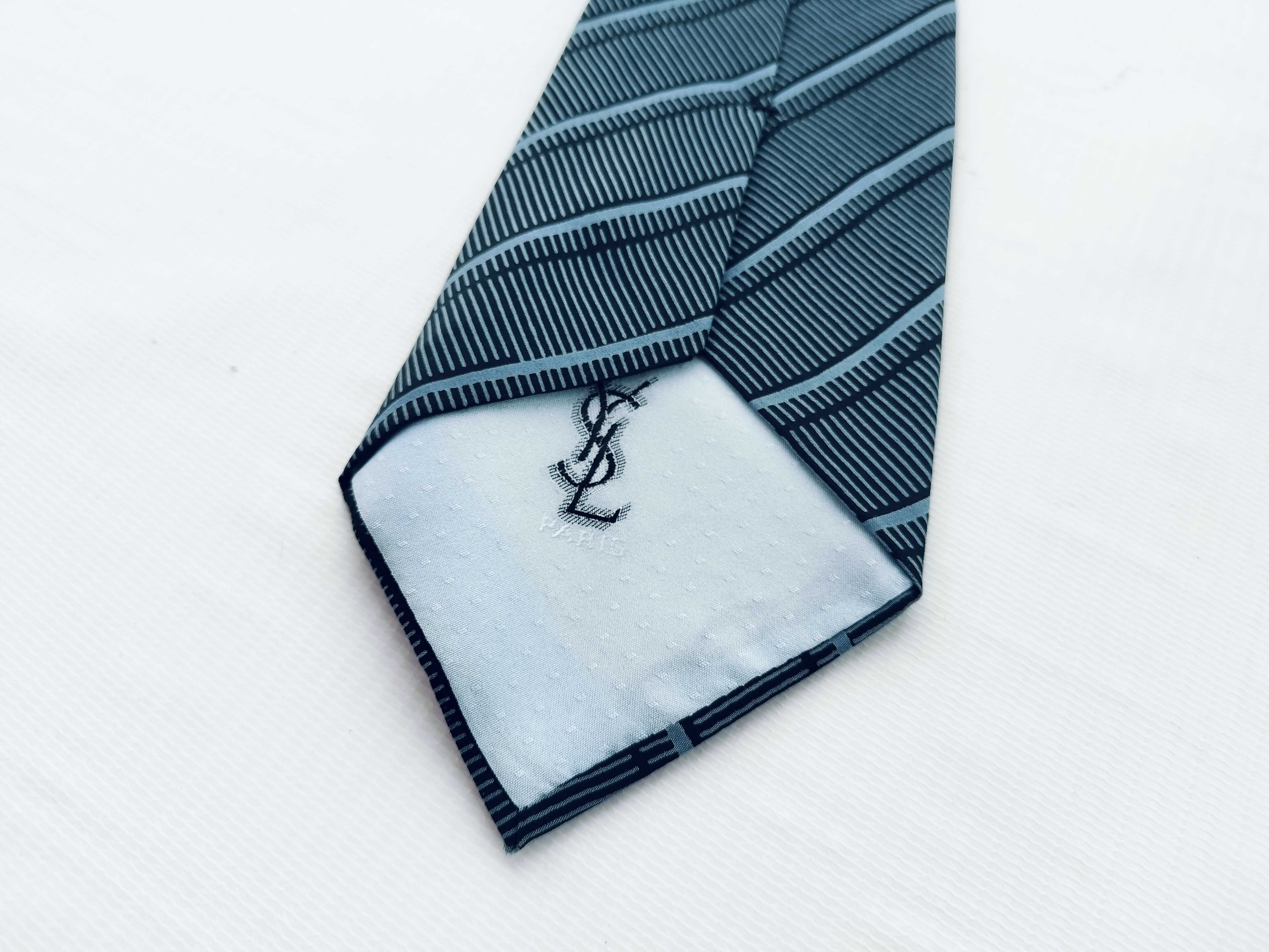 A Collection of Six Designer Silk Neckties Including Salvatore Ferragamo, Fendi, and Yves Saint Laurent
