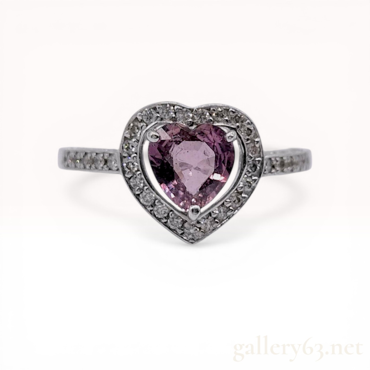 18 Karat White Gold Heart Shaped Sapphire and Diamond Halo Ring