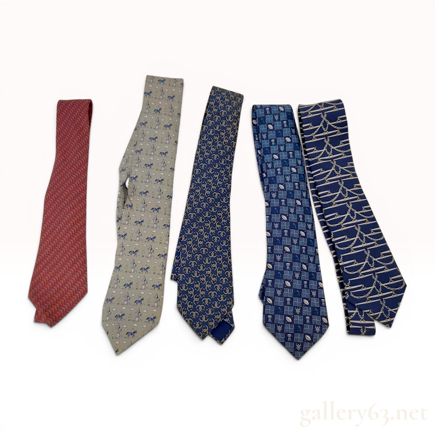 A Collection of Five Designer Silk Neckties Including Hermes