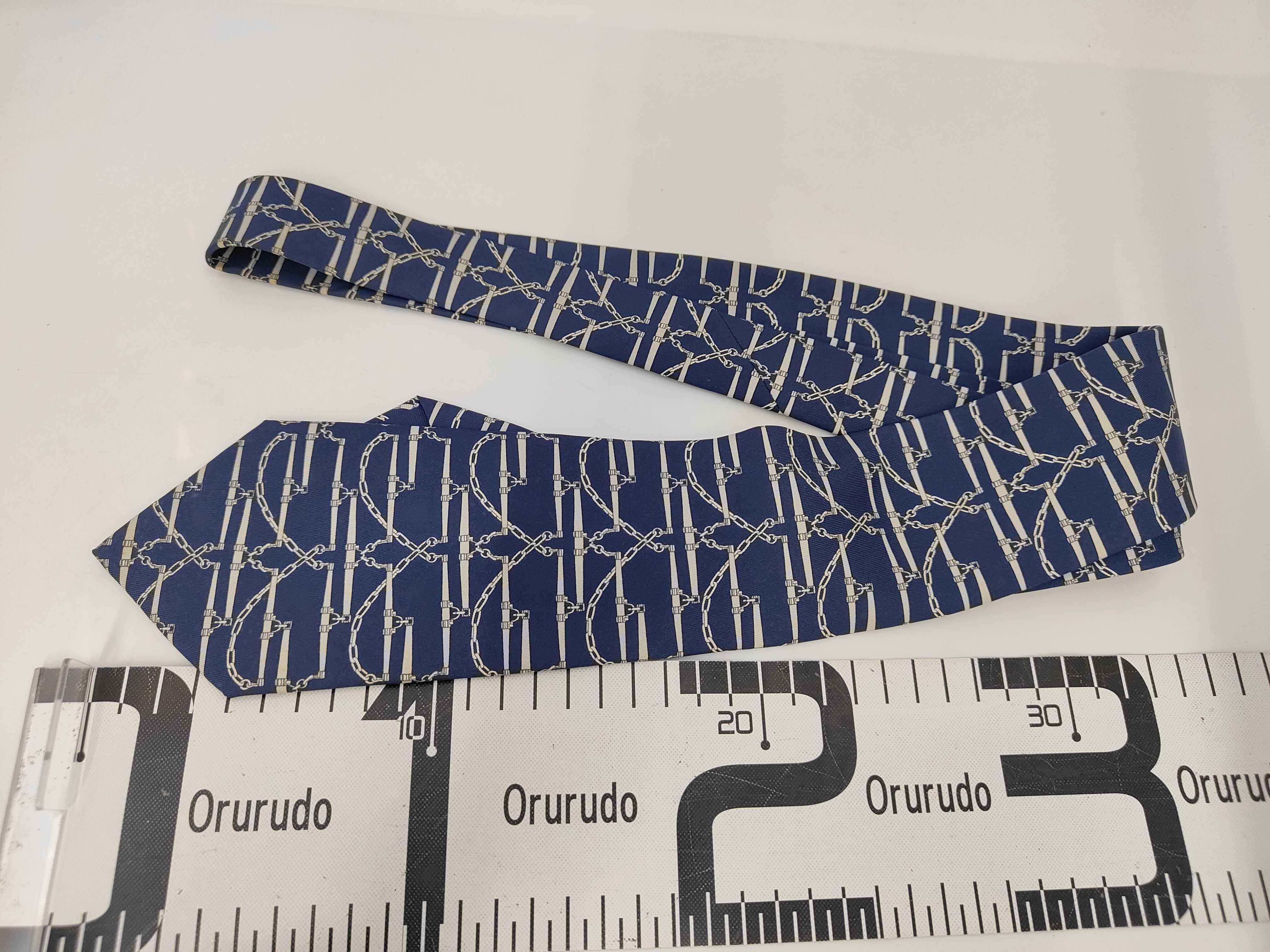 A Collection of Five Designer Silk Neckties Including Hermes