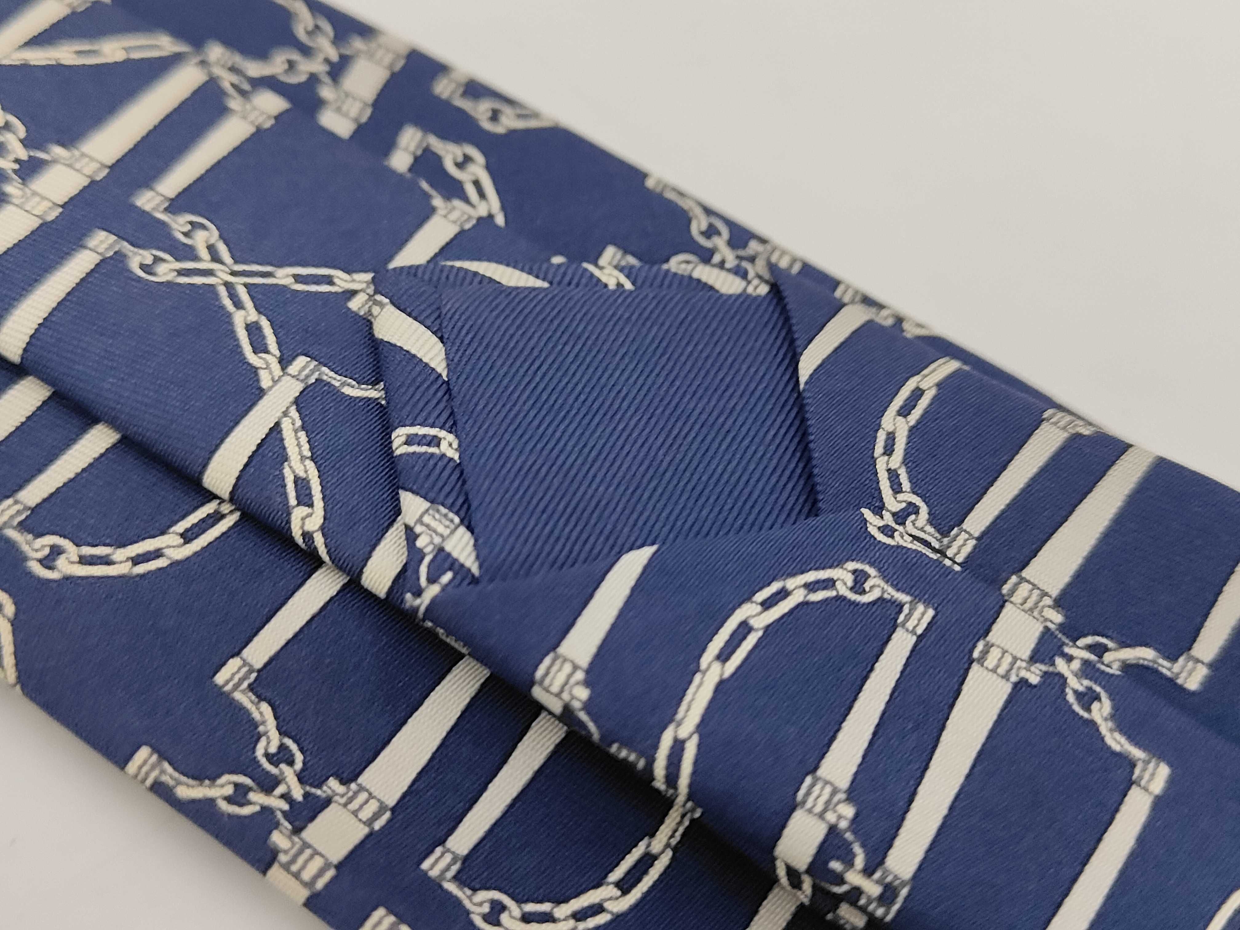 A Collection of Five Designer Silk Neckties Including Hermes