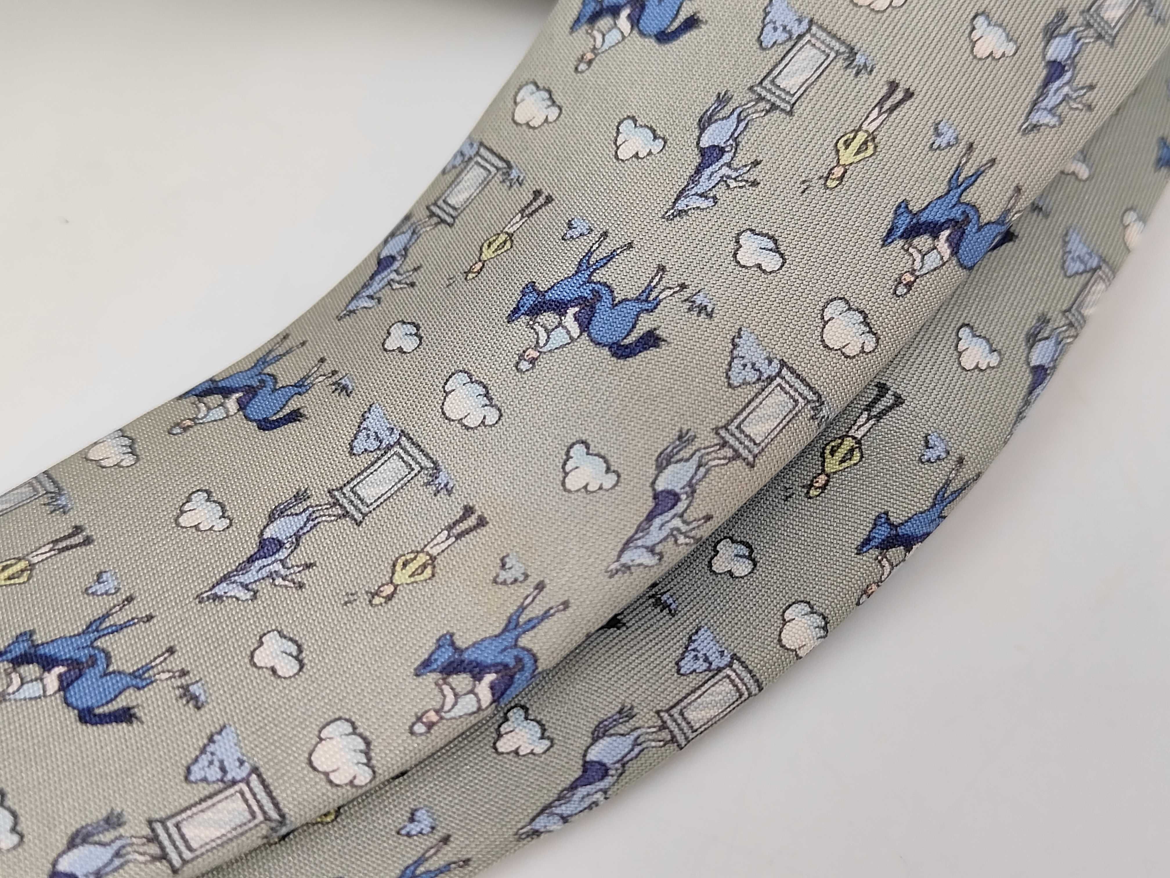 A Collection of Five Designer Silk Neckties Including Hermes