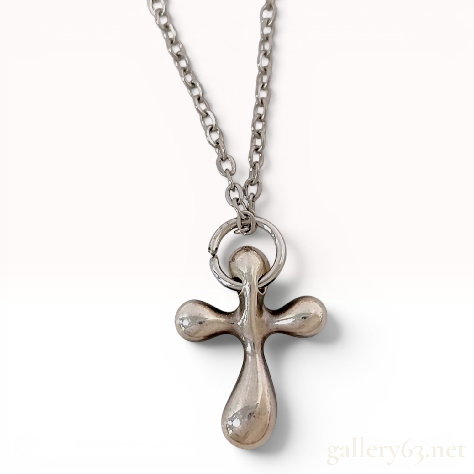 Stainless Steel Small Cross Pendant Necklace in the Style of Elsa Peretti