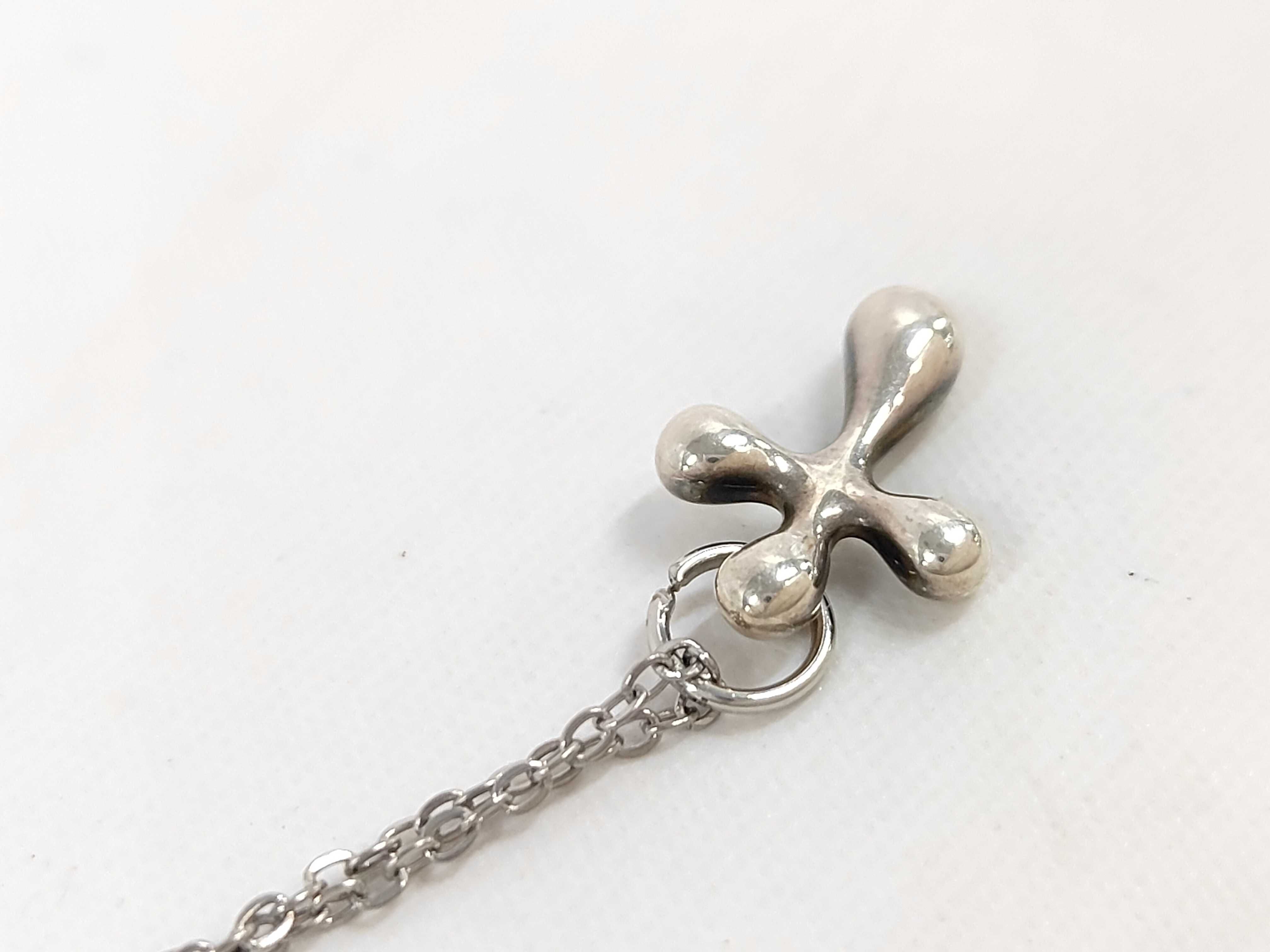 Stainless Steel Small Cross Pendant Necklace in the Style of Elsa Peretti
