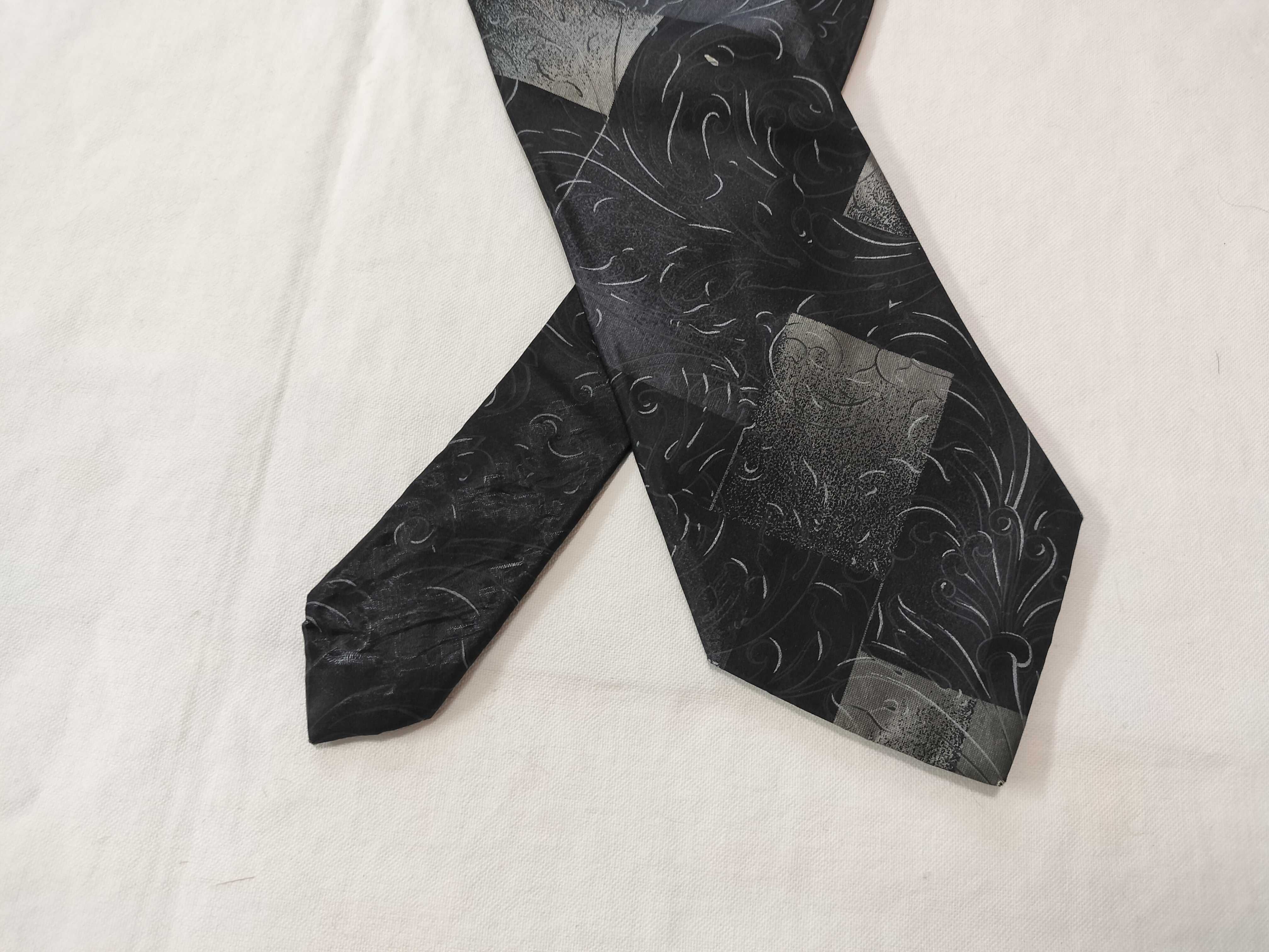 A Collection of Designer Silk Neckties including Hermes, Ferragamo, Versace, and Fendi