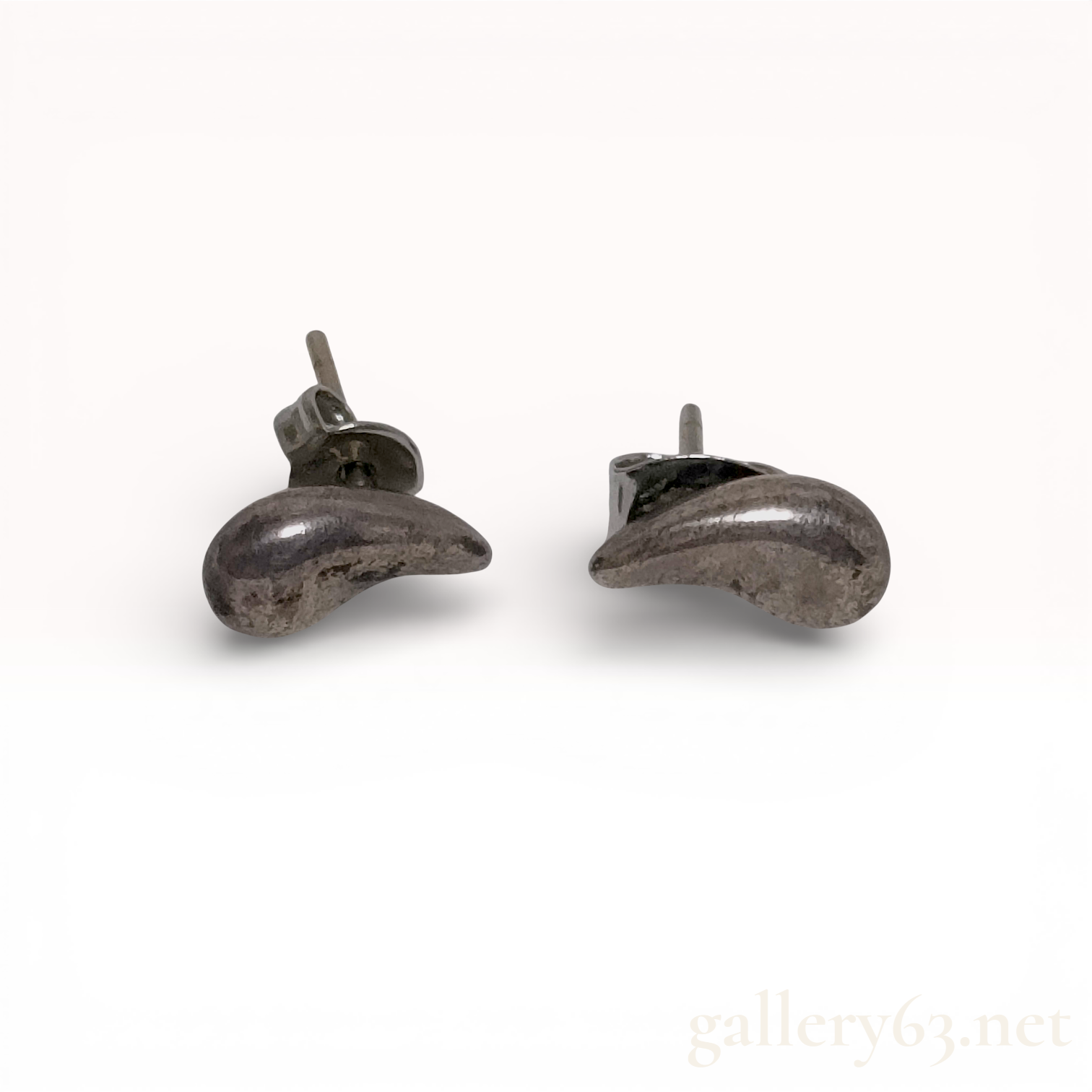 A Pair of Silver-Tone Bean Motif Stud Earrings