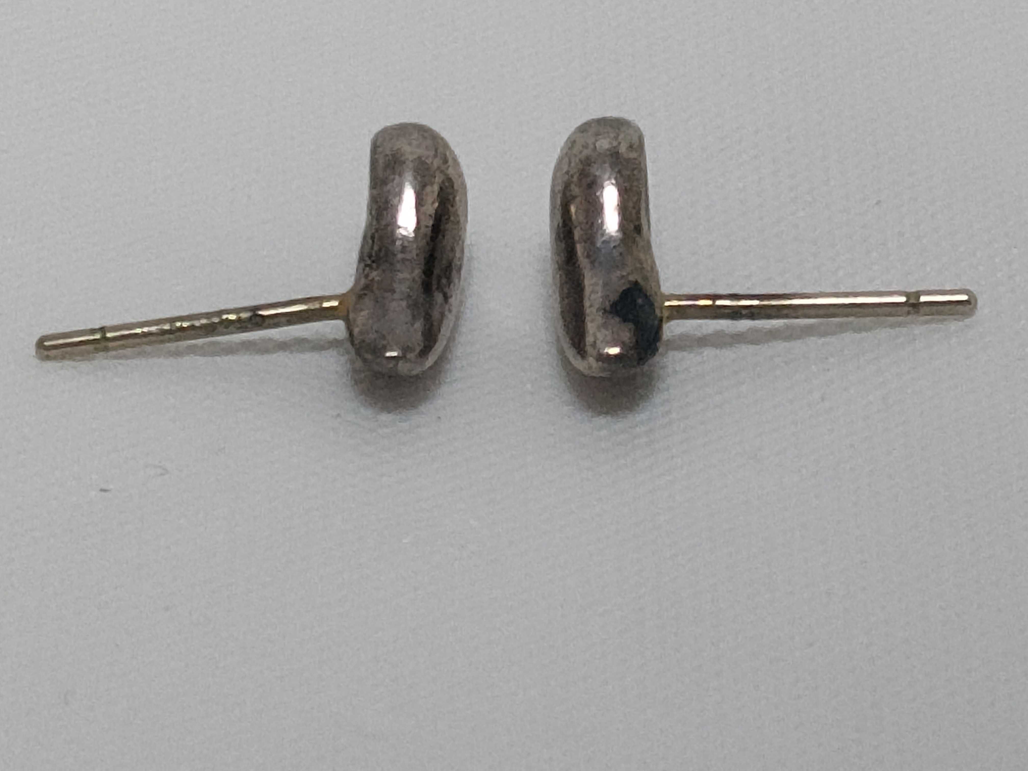 A Pair of Silver-Tone Bean Motif Stud Earrings