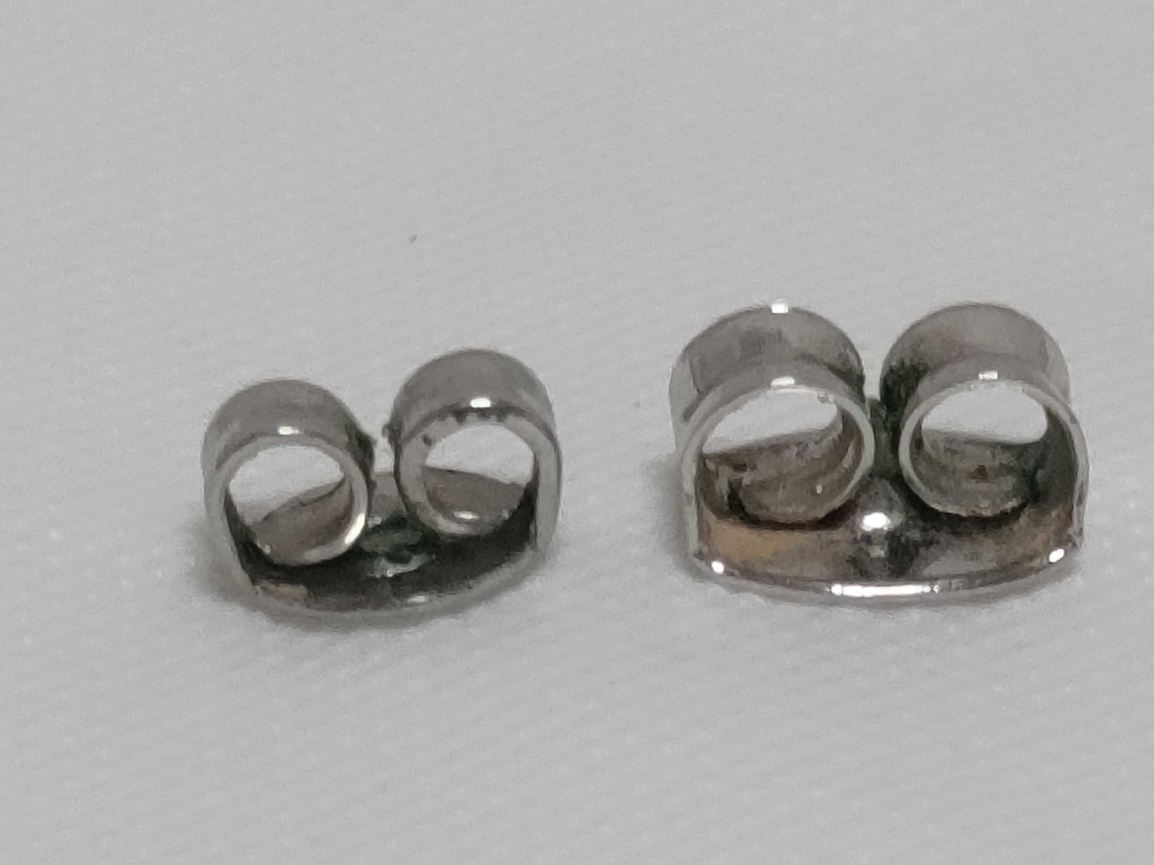 A Pair of Silver-Tone Bean Motif Stud Earrings