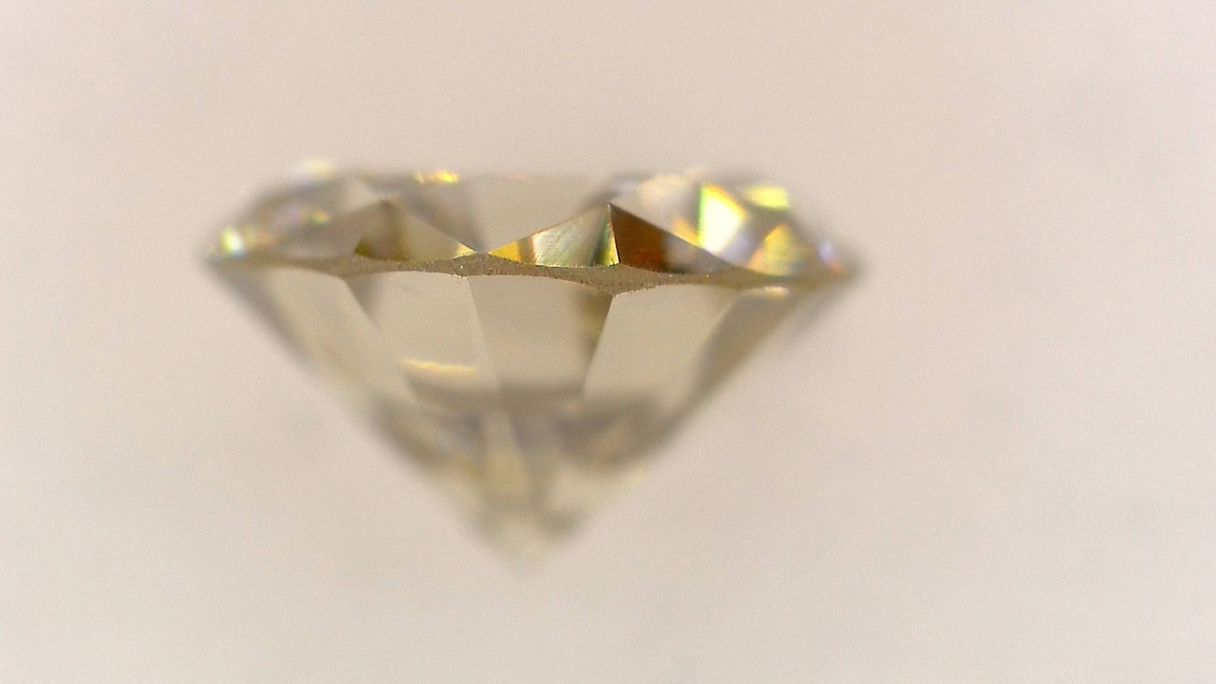 0.398 ct Fancy Light Brown Round Brilliant Cut Natural Diamond with CGL Report