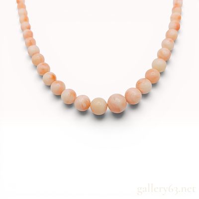 Graduated Antique Angel Skin Coral Bead Necklace with Filigree Clasp. A graduated bead necklace 