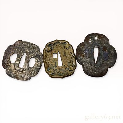A Trio of Japanese Iron and Copper Alloy Tsuba, Edo Period. A trio of Japanese sword guards 