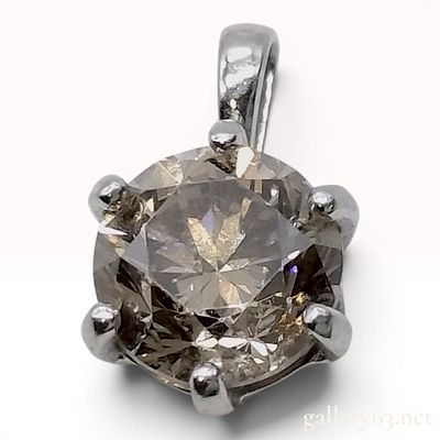 Pure Platinum One Carat Round Brilliant Cut Champagne Diamond Platinum Solitaire Pendant. This 