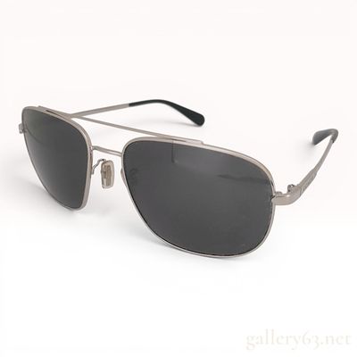 Coach HC 7084 L1056 Men's Aviator Sunglasses and Case. A pair of Coach aviator-style sunglasses 