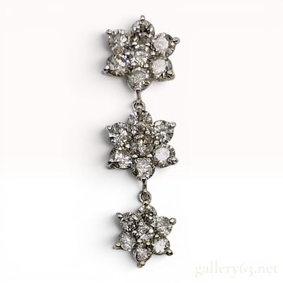 14K Gold and Diamond Triple Floral Cluster Drop Pendant. A 14 karat gold triple-drop pendant 