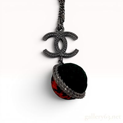 Chanel Gunmetal-Tone Fall 2013 CC Logo and Tweed Ball Necklace. A Chanel designer pendant 