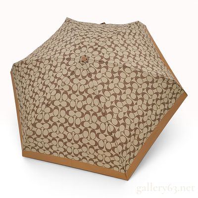 Coach UV Protection Signature Mini Umbrella with Matching Sleeve and Storage Bag. This Coach 