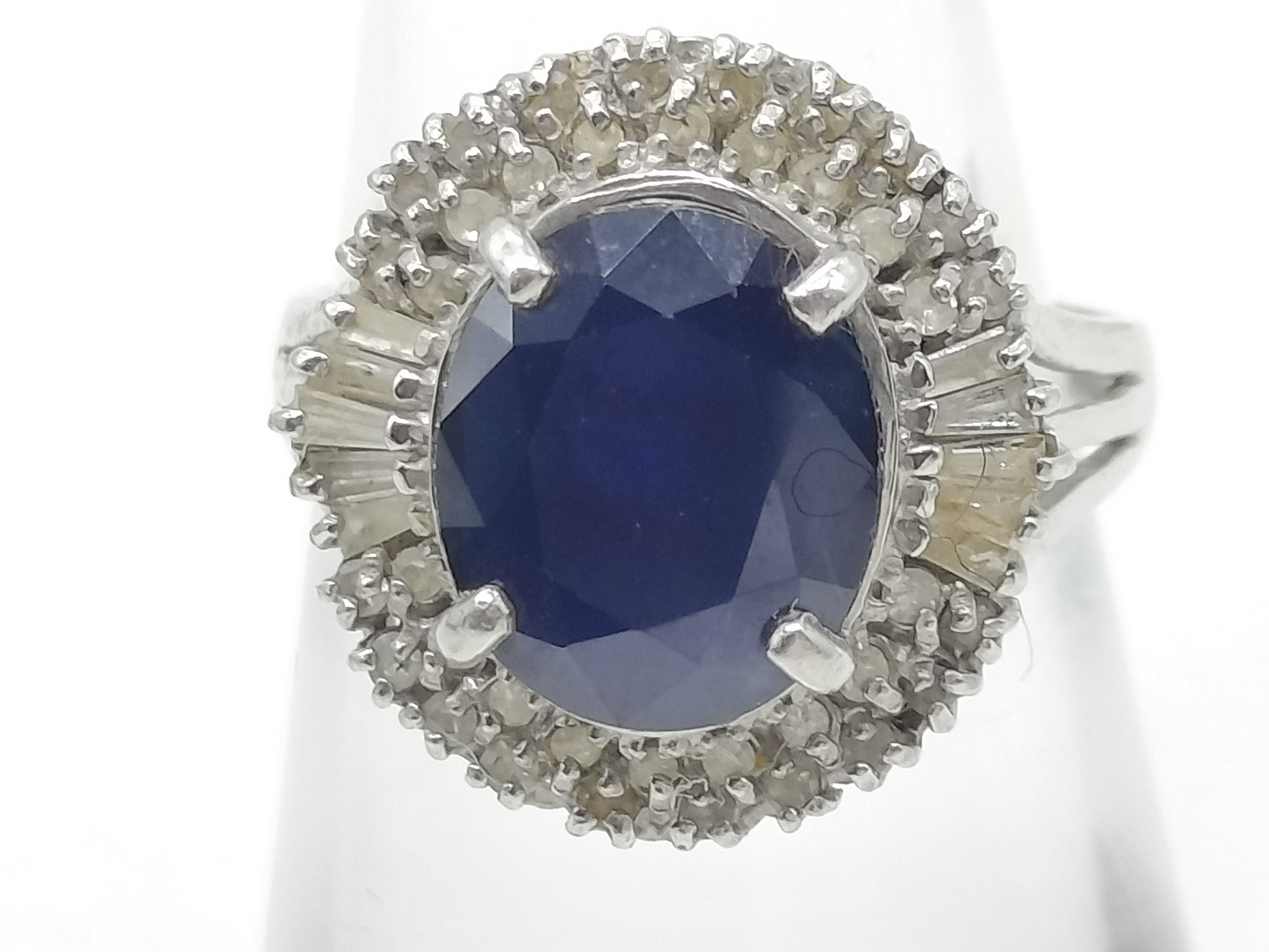 Platinum 3.0 Carat Oval Blue Sapphire and 0.35ctw Diamond Ballerina Halo Ring