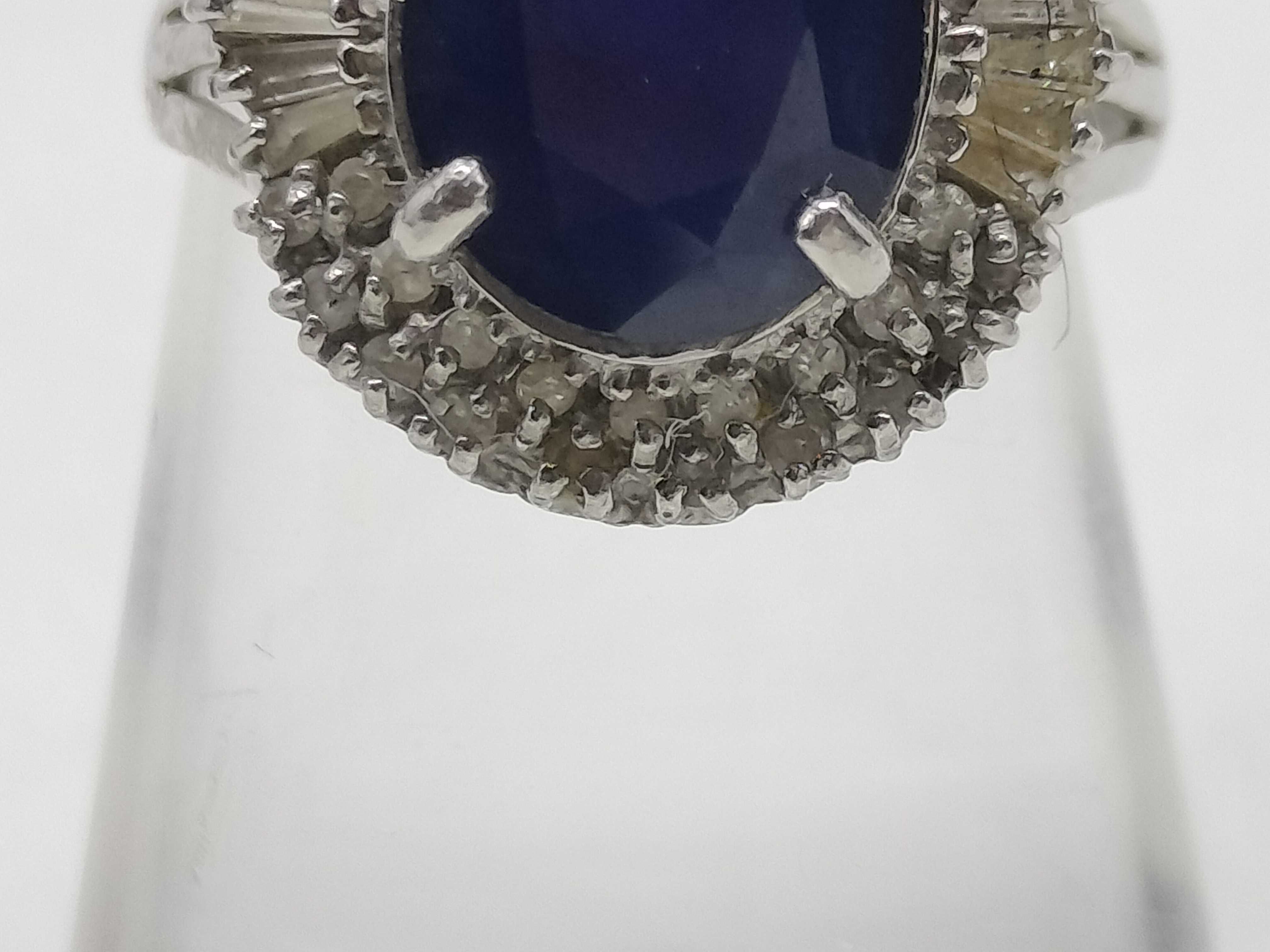 Platinum 3.0 Carat Oval Blue Sapphire and 0.35ctw Diamond Ballerina Halo Ring