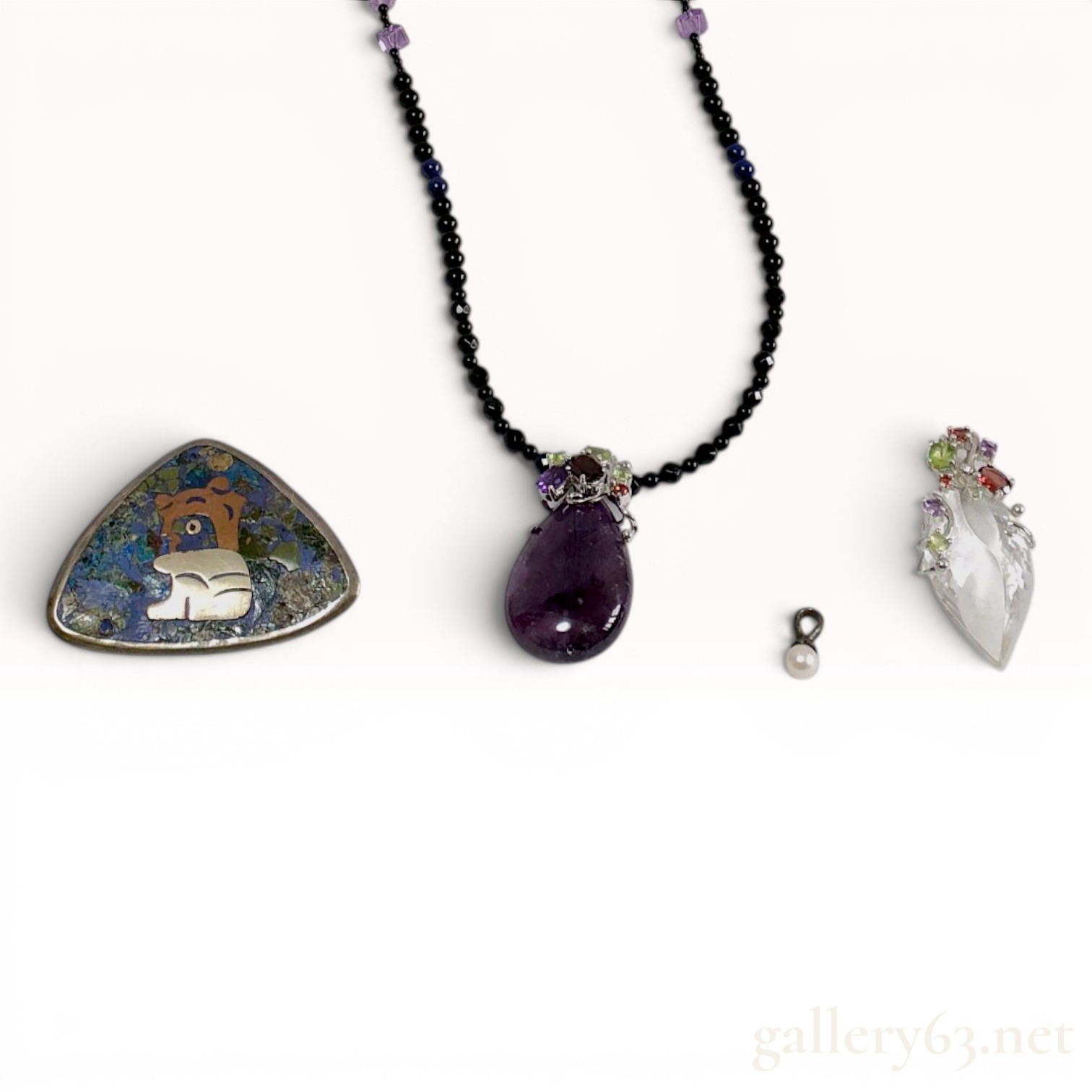 An Assortment of Four Sterling Silver and Multi-Gem Jewelry Items