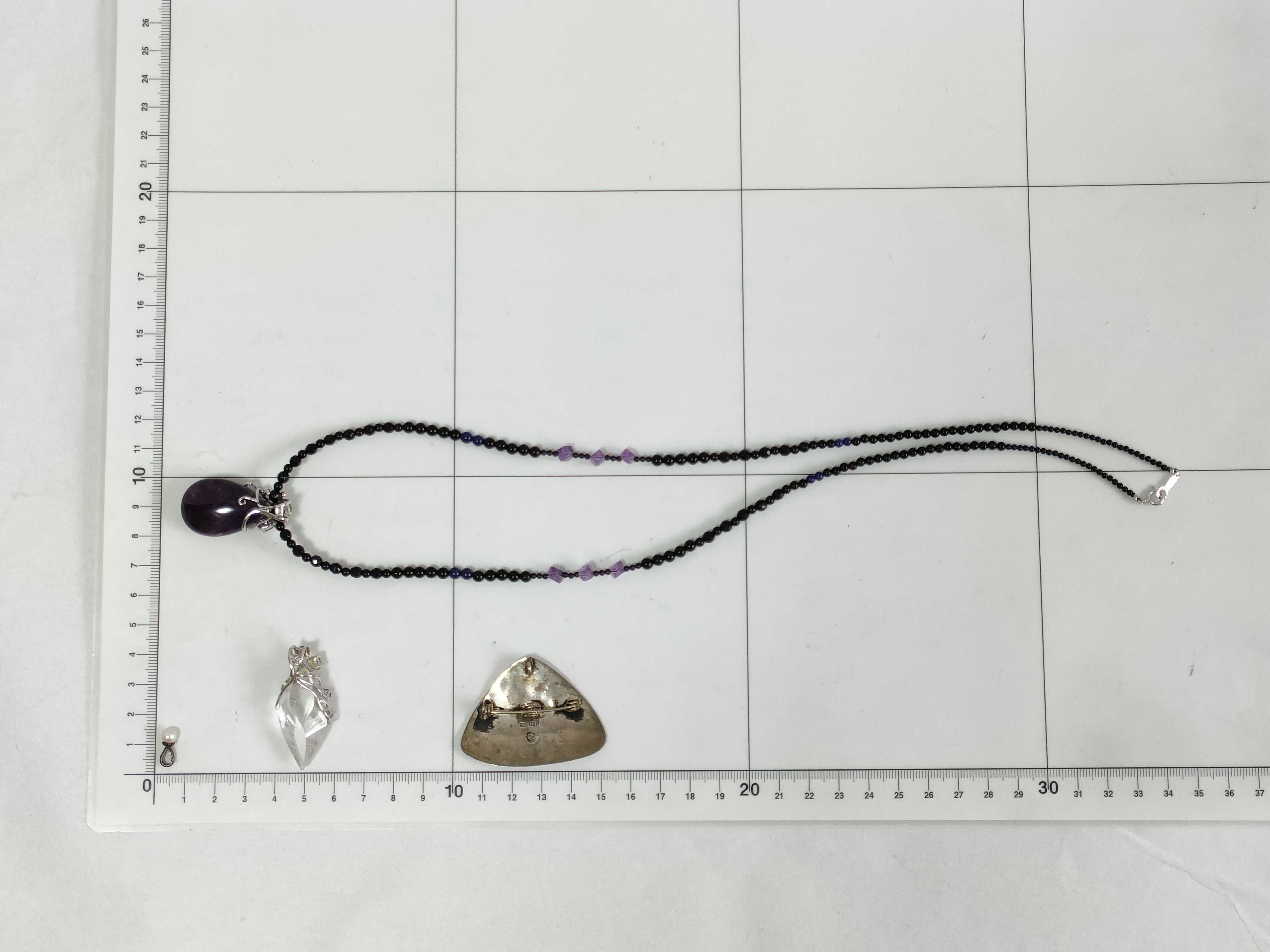 An Assortment of Four Sterling Silver and Multi-Gem Jewelry Items