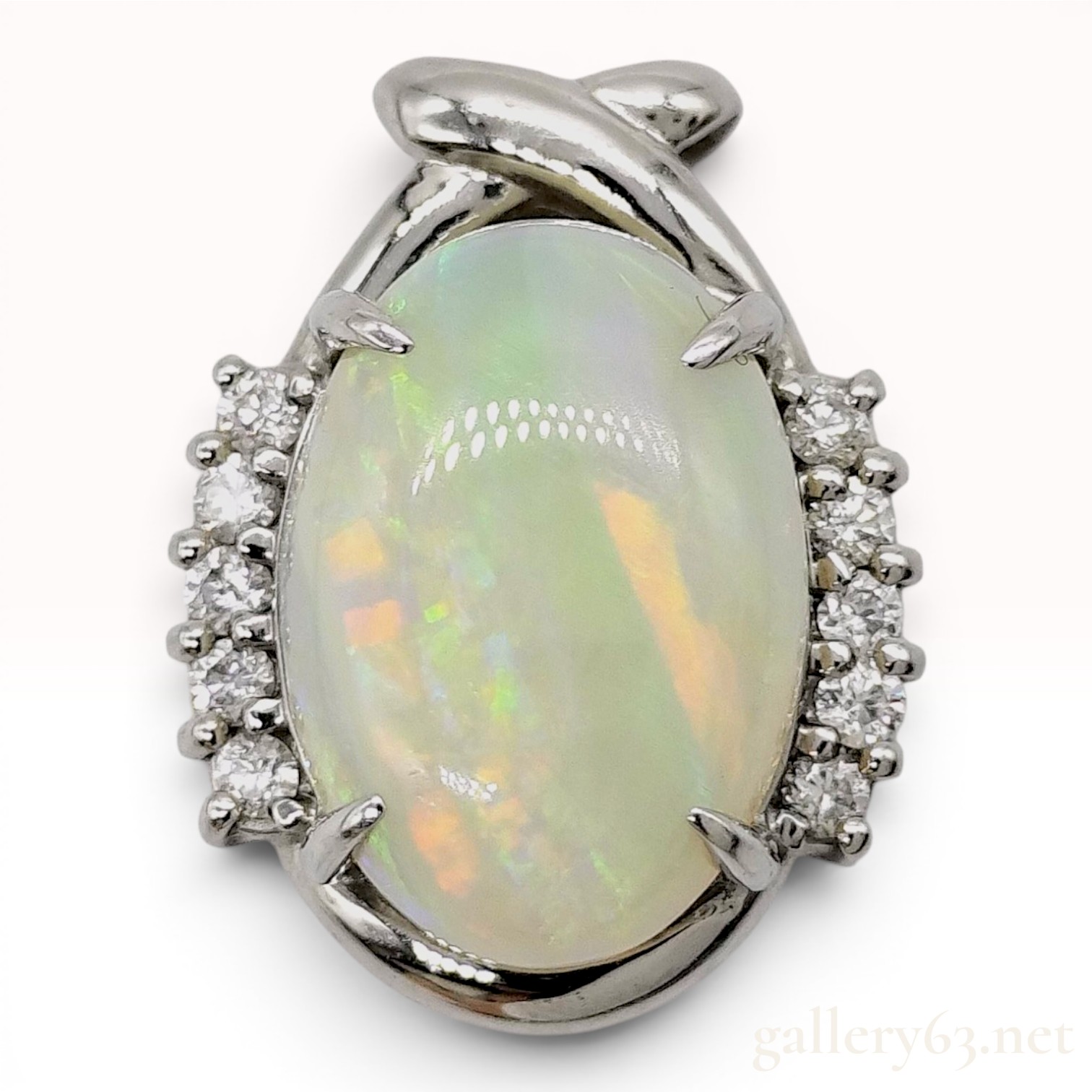 Platinum 2.95 Carat Opal and 0.15 Carat Diamond Bypass Cluster Pendant