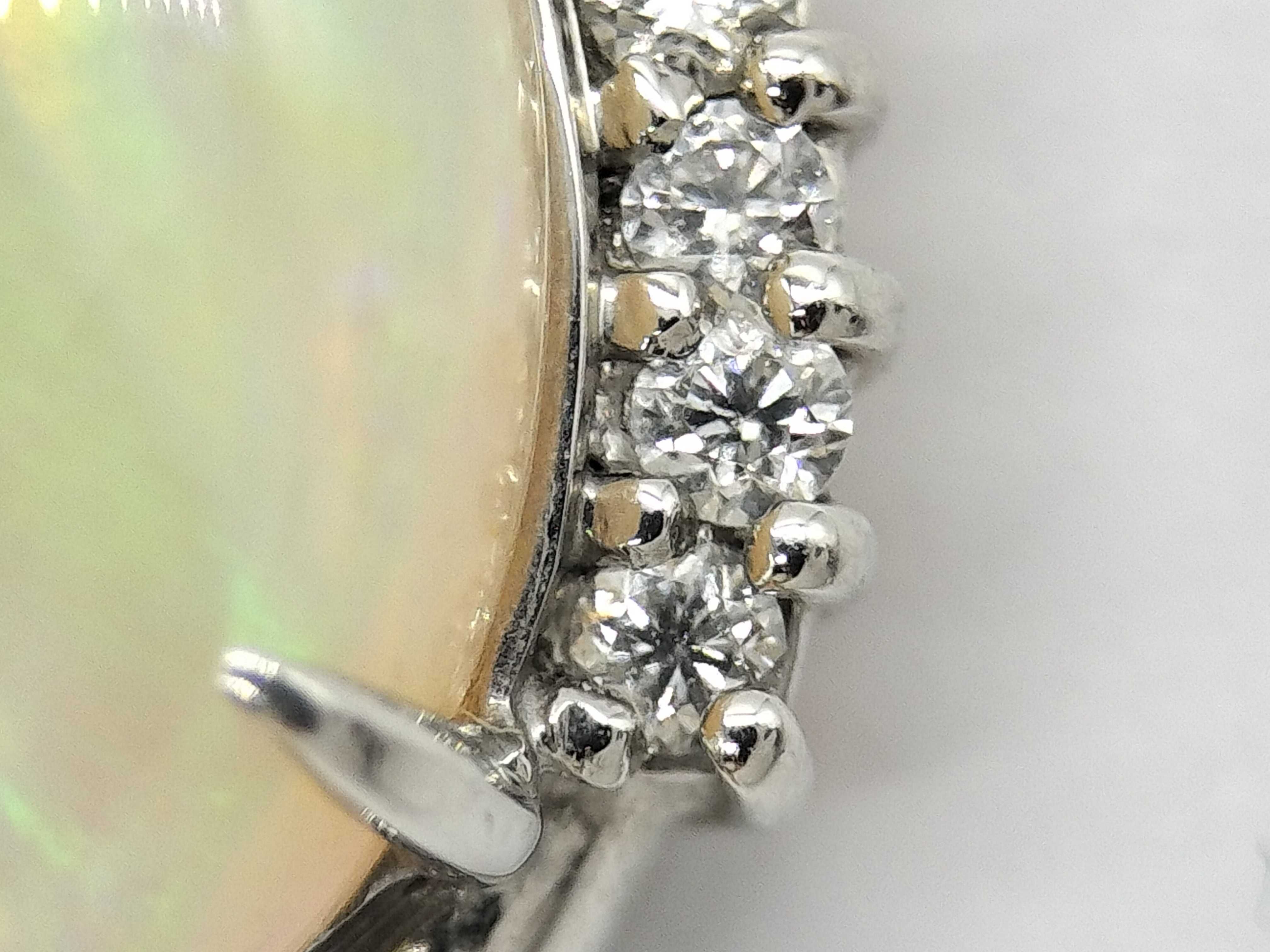 Platinum 2.95 Carat Opal and 0.15 Carat Diamond Bypass Cluster Pendant