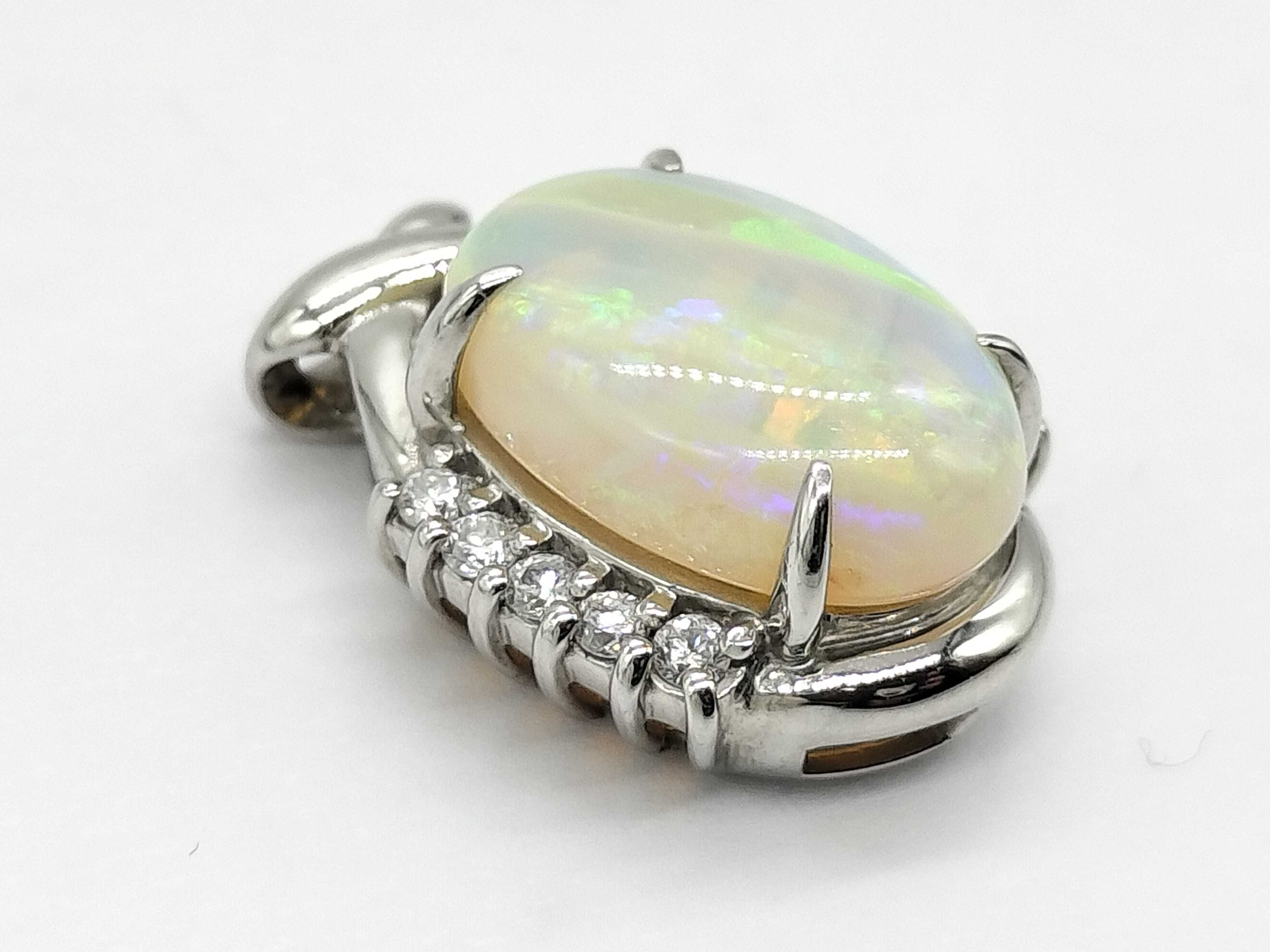 Platinum 2.95 Carat Opal and 0.15 Carat Diamond Bypass Cluster Pendant