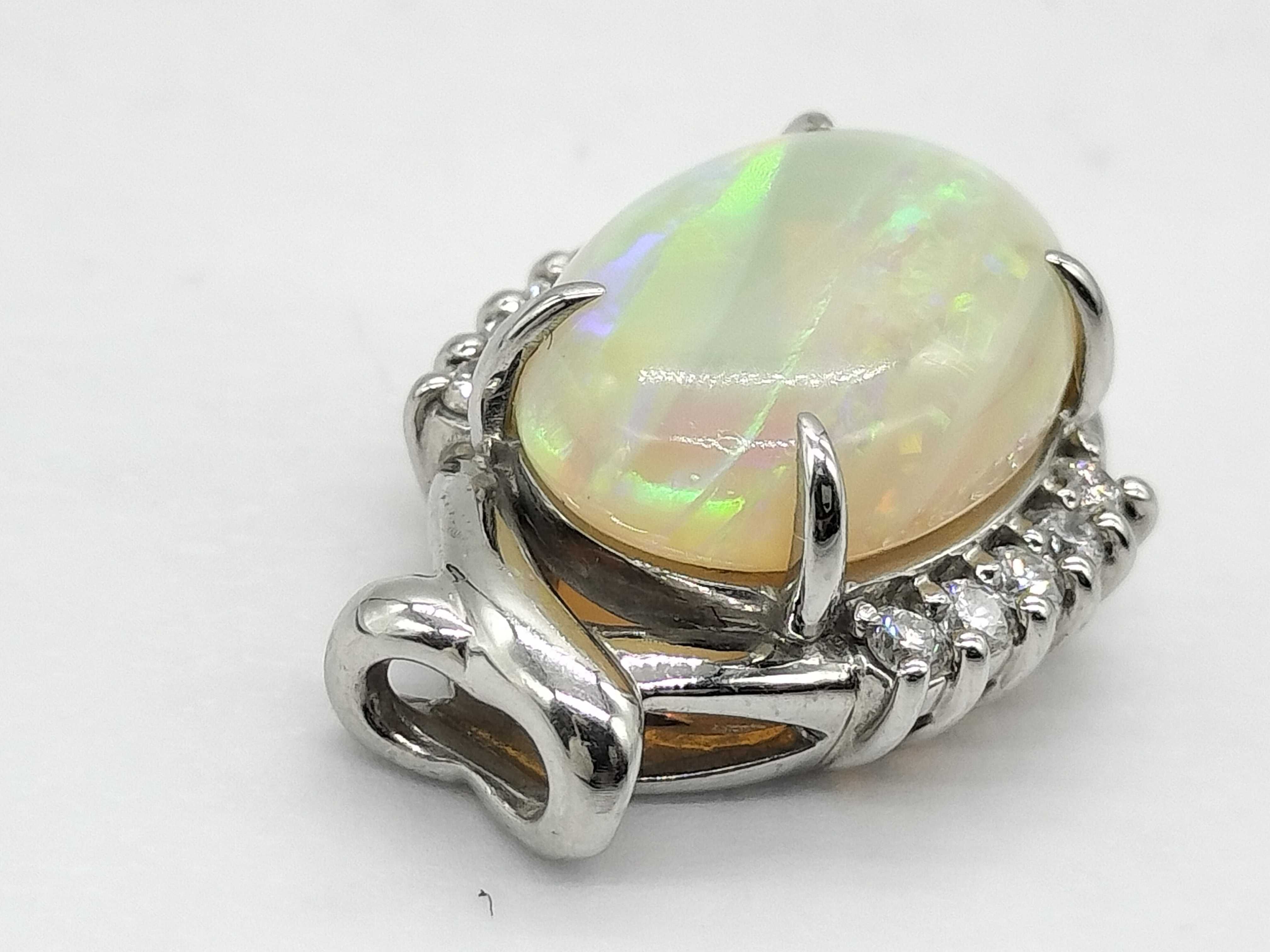 Platinum 2.95 Carat Opal and 0.15 Carat Diamond Bypass Cluster Pendant