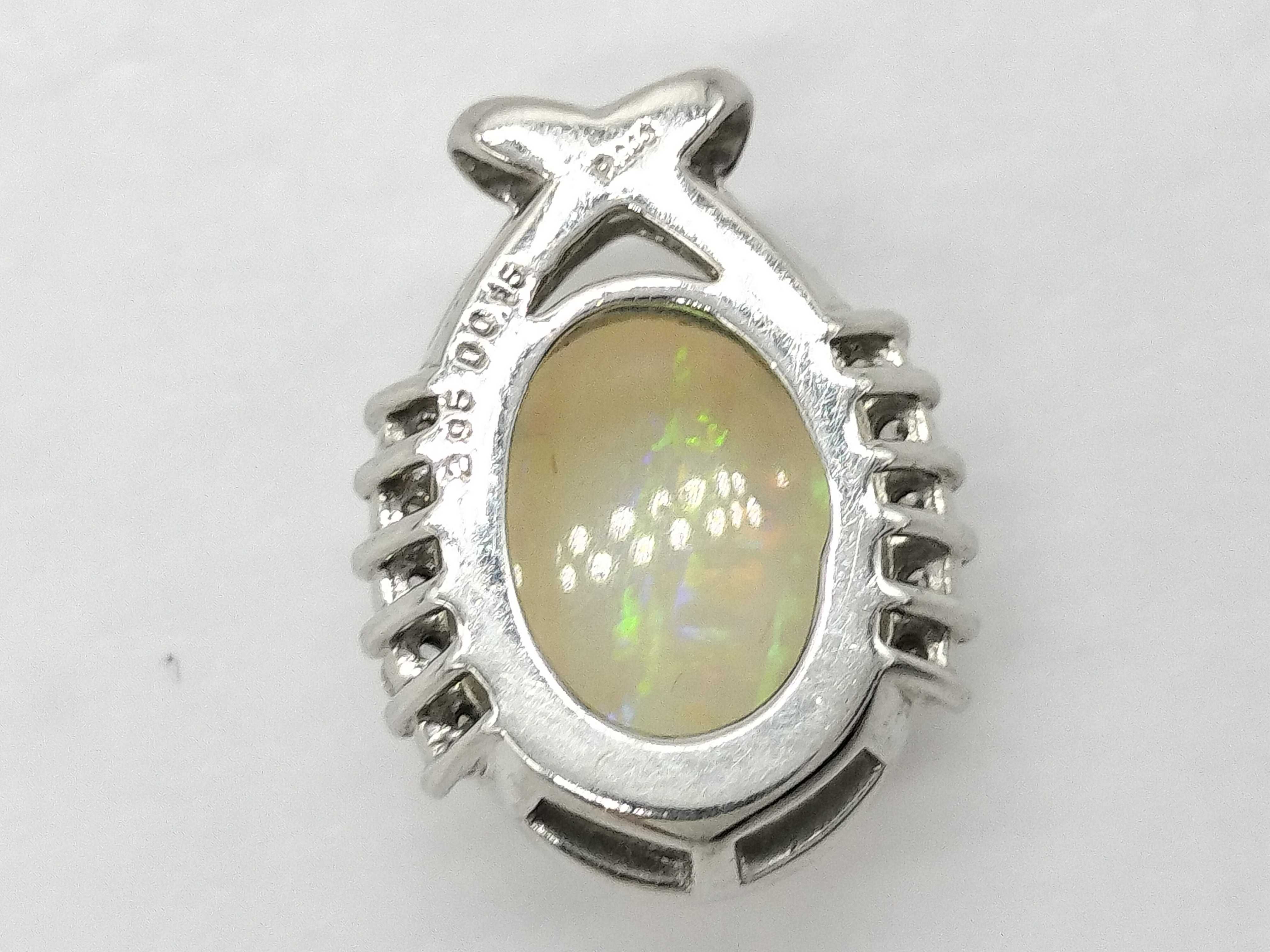 Platinum 2.95 Carat Opal and 0.15 Carat Diamond Bypass Cluster Pendant
