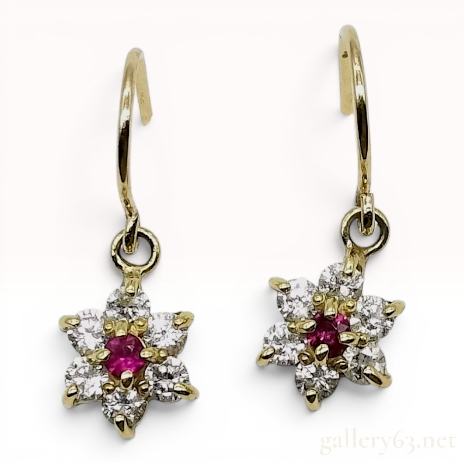 A Pair of 18 Karat Yellow Gold Ruby and Diamond Floral Cluster Drop Earrings