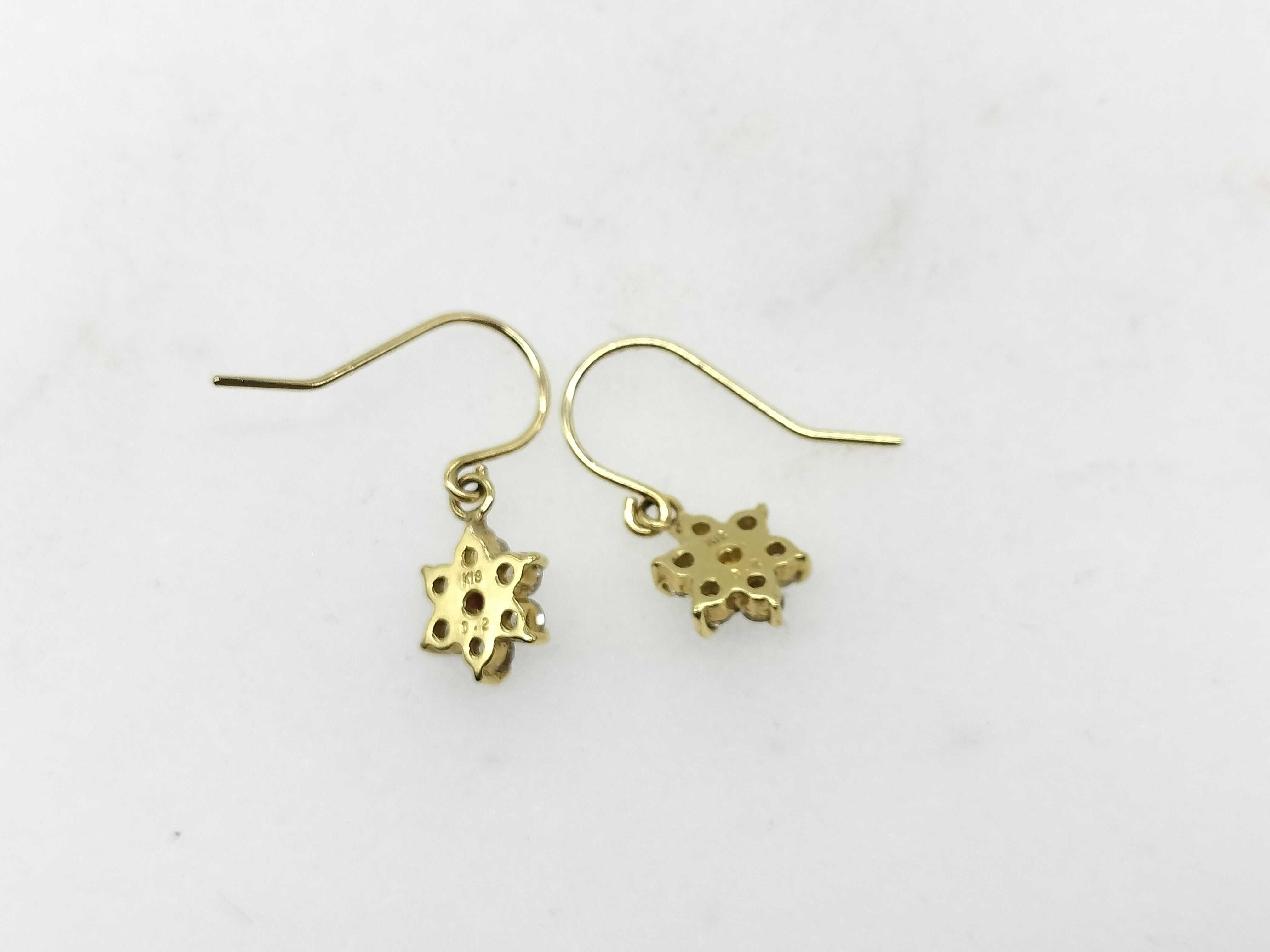 A Pair of 18 Karat Yellow Gold Ruby and Diamond Floral Cluster Drop Earrings