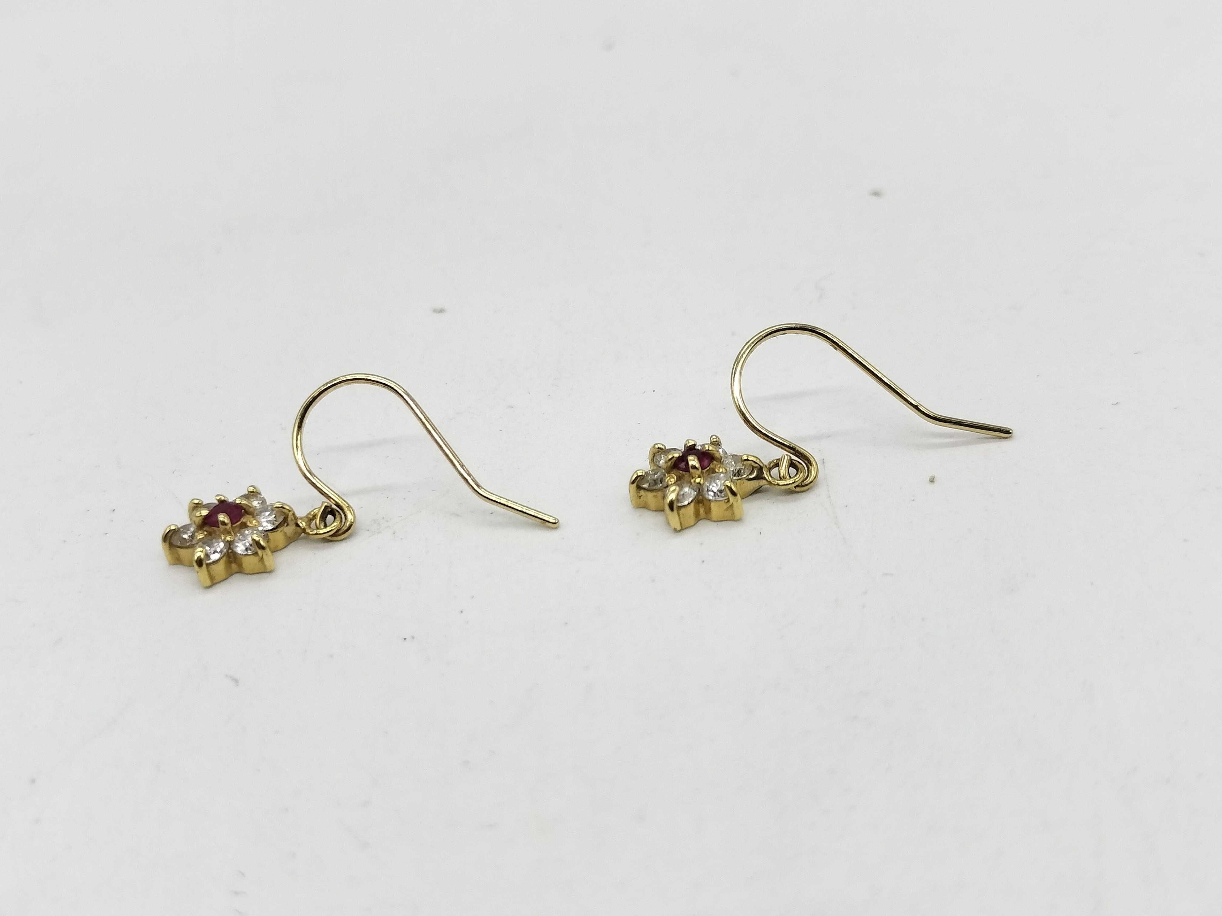 A Pair of 18 Karat Yellow Gold Ruby and Diamond Floral Cluster Drop Earrings
