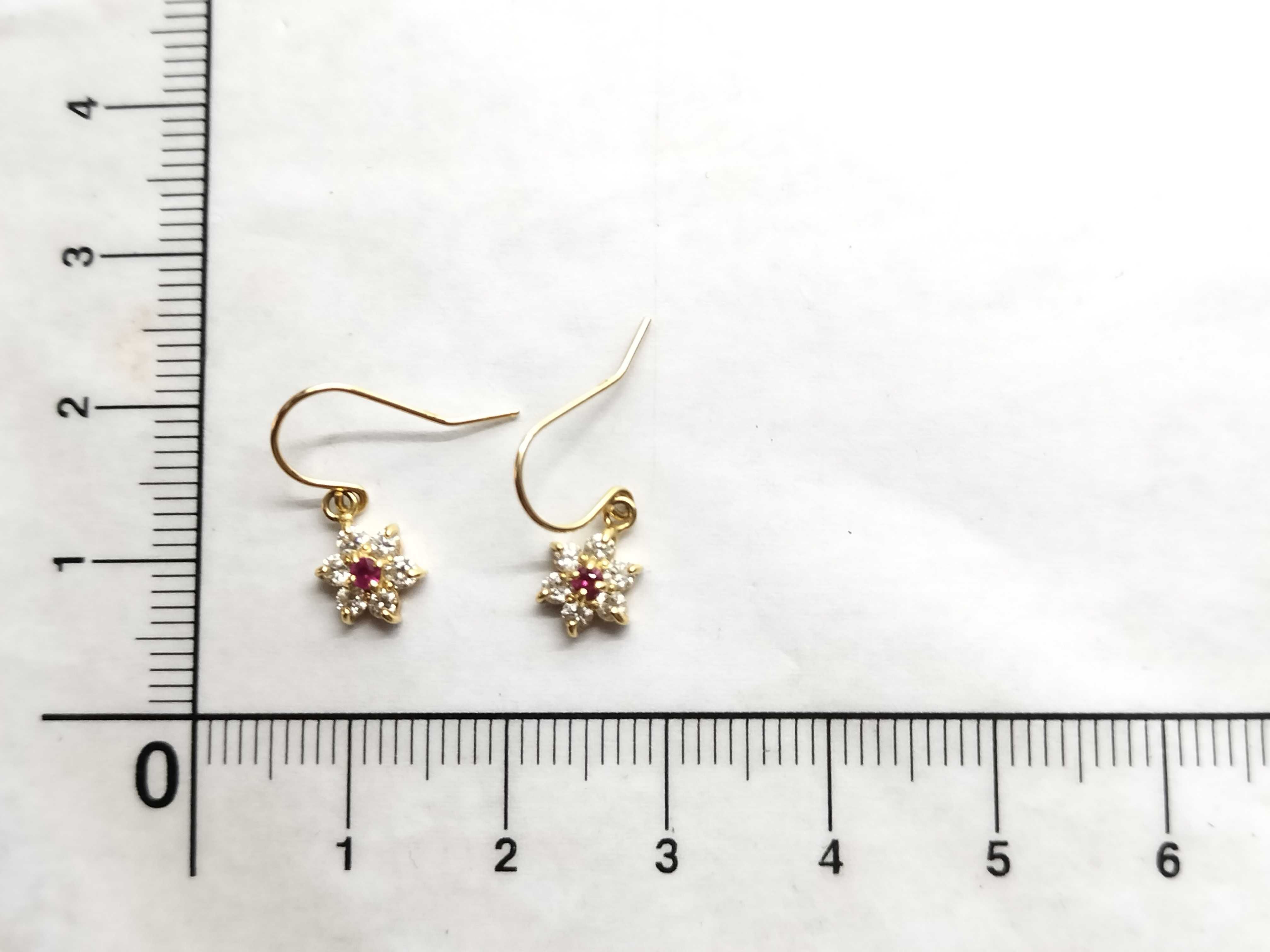 A Pair of 18 Karat Yellow Gold Ruby and Diamond Floral Cluster Drop Earrings