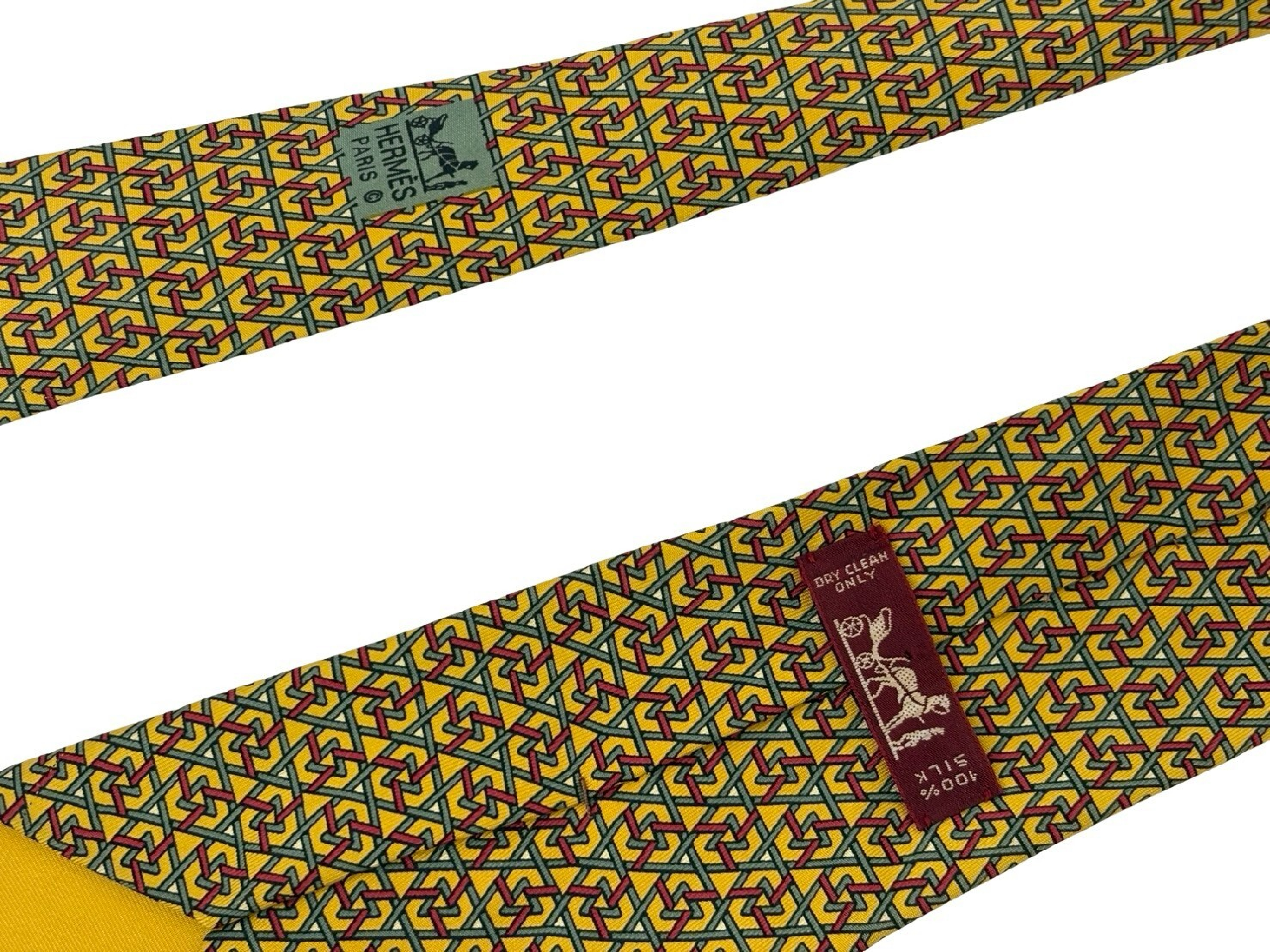 Hermes Men's Silk Necktie Featuring a Yellow and Green Geometric Trellis Pattern